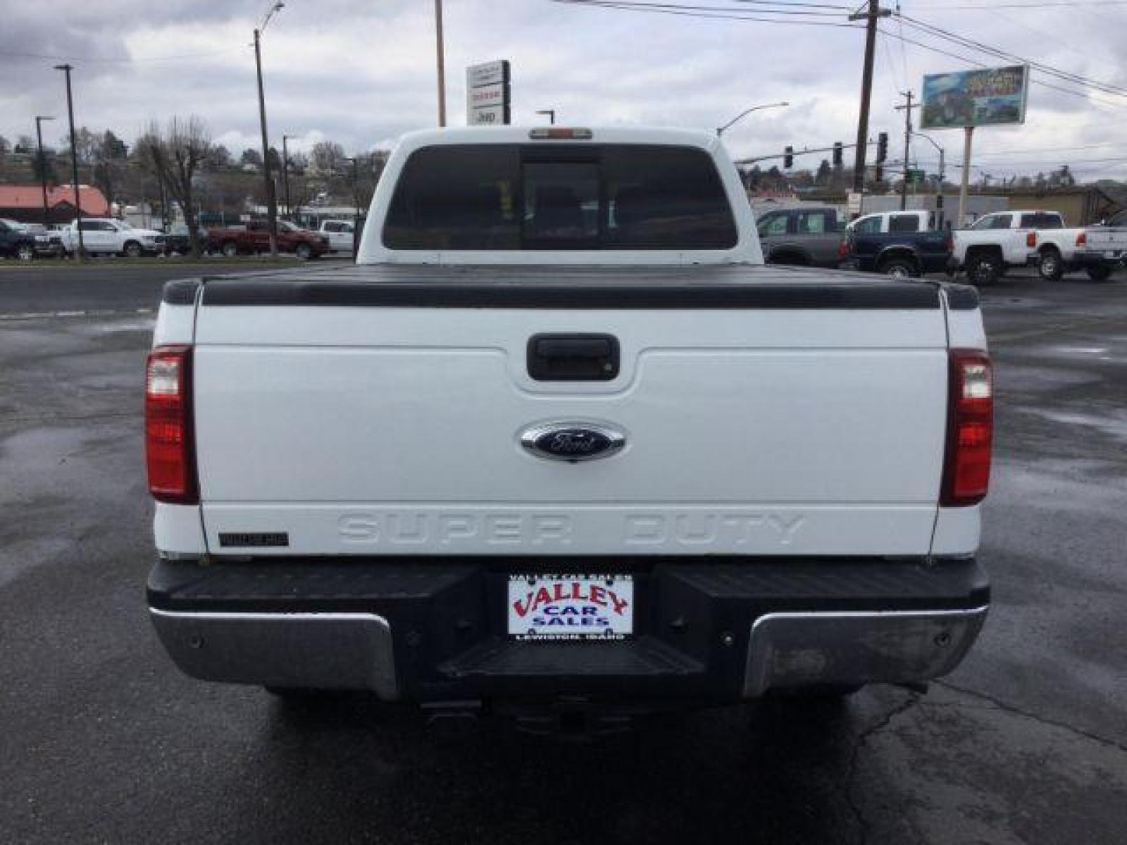 2014 Oxford White /BLACK LEATHER Ford F-350 SD Lariat Crew Cab Long Bed 4WD (1FT8W3BT2EE) with an 6.7L V8 OHV 16V DIESEL engine, 6-Speed Automatic transmission, located at 1801 Main Street, Lewiston, 83501, (208) 743-9371, 46.417065, -117.004799 - Photo #5