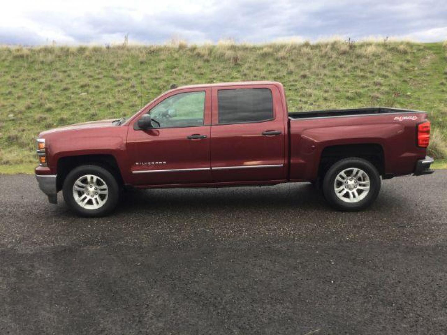 2014 Deep Ruby Metallic /Jet Black Chevrolet Silverado 1500 1LT Crew Cab 4WD (3GCUKREC4EG) with an 5.3L V8 OHV 16V engine, 6-Speed Automatic transmission, located at 1801 Main Street, Lewiston, 83501, (208) 743-9371, 46.417065, -117.004799 - Photo#1