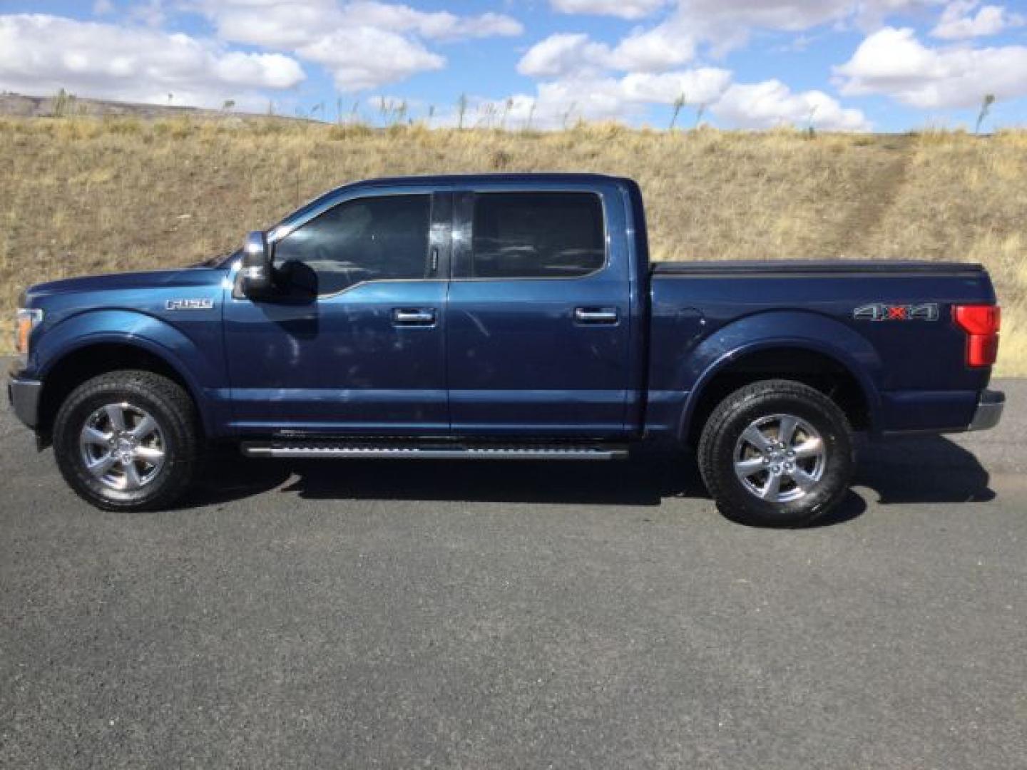 2018 Blue Jeans Metallic /Black, leather Ford F-150 Lariat SuperCrew 5.5-ft. Bed 4WD (1FTEW1E50JF) with an 5.0L V8 OHV 32V engine, 10-speed automatic transmission, located at 1801 Main Street, Lewiston, 83501, (208) 743-9371, 46.417065, -117.004799- Photo#1