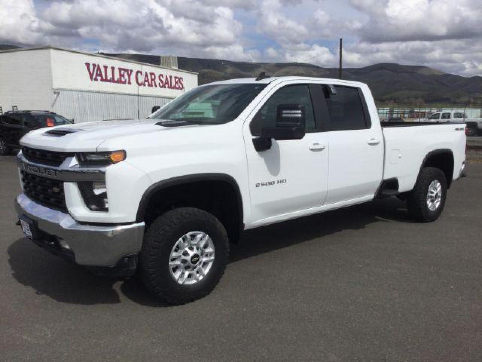 2020 Summit White /Gideon/Very Dark Atmosphere, leather Chevrolet Silverado 2500HD LT Crew Cab Long Box 4WD (1GC4YNEY5LF) with an 6.6L V8 OHV 16V DIESEL engine, 6-Speed Automatic transmission, located at 1801 Main Street, Lewiston, 83501, (208) 743-9371, 46.417065, -117.004799 - Photo #0