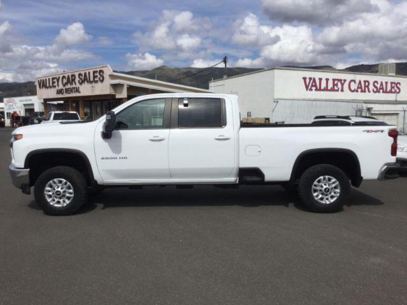 2020 Summit White /Gideon/Very Dark Atmosphere, leather Chevrolet Silverado 2500HD LT Crew Cab Long Box 4WD (1GC4YNEY5LF) with an 6.6L V8 OHV 16V DIESEL engine, 6-Speed Automatic transmission, located at 1801 Main Street, Lewiston, 83501, (208) 743-9371, 46.417065, -117.004799 - Photo #1