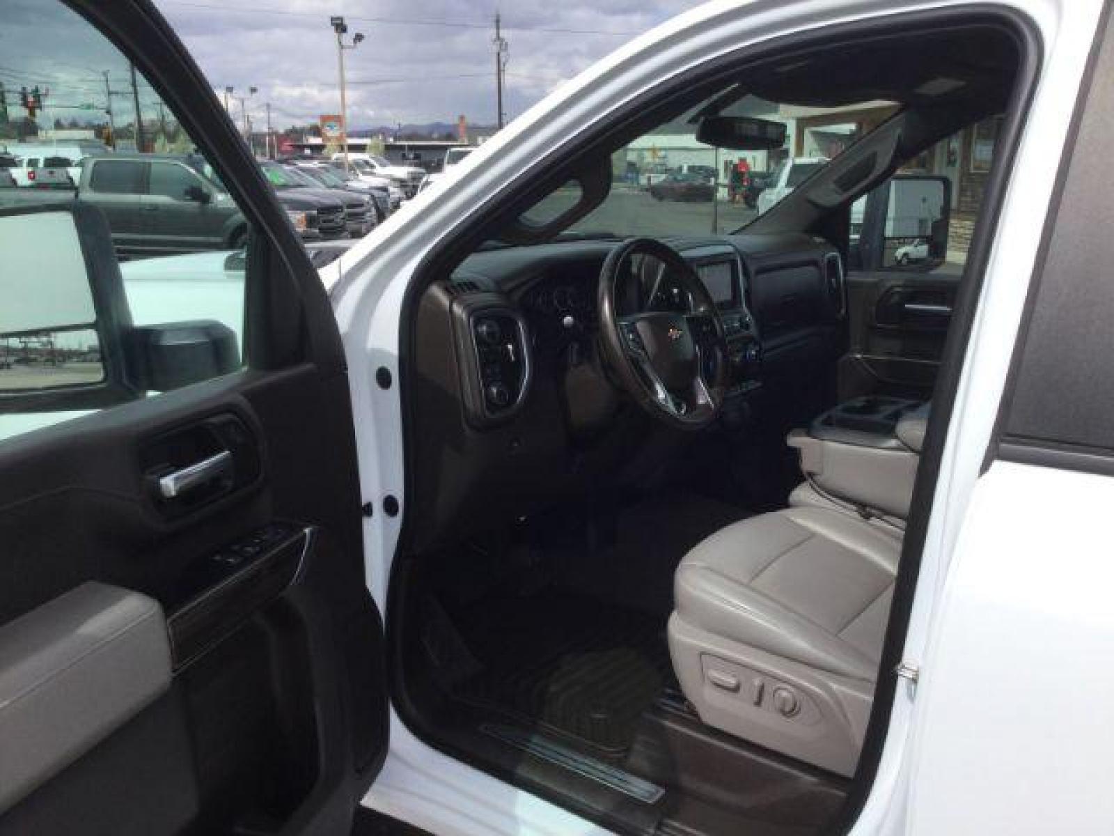 2020 Summit White /Gideon/Very Dark Atmosphere, leather Chevrolet Silverado 2500HD LT Crew Cab Long Box 4WD (1GC4YNEY5LF) with an 6.6L V8 OHV 16V DIESEL engine, 6-Speed Automatic transmission, located at 1801 Main Street, Lewiston, 83501, (208) 743-9371, 46.417065, -117.004799 - Photo #3