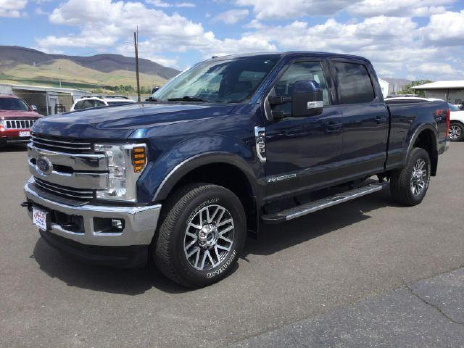 2018 Blue Jeans Metallic/Magnetic Metallic /Black, leather Ford F-350 SD Lariat Crew Cab 4WD (1FT8W3BT0JE) with an 6.7L V8 OHV 16V DIESEL engine, 6-Speed Automatic transmission, located at 1801 Main Street, Lewiston, 83501, (208) 743-9371, 46.417065, -117.004799 - Photo #0