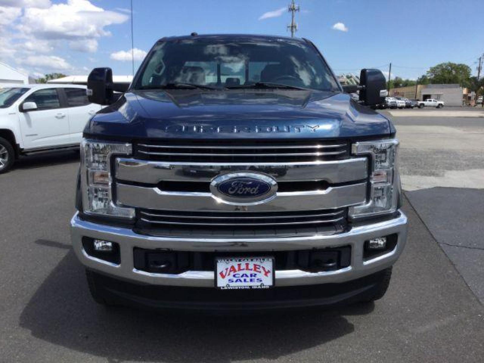 2018 Blue Jeans Metallic/Magnetic Metallic /Black, leather Ford F-350 SD Lariat Crew Cab 4WD (1FT8W3BT0JE) with an 6.7L V8 OHV 16V DIESEL engine, 6-Speed Automatic transmission, located at 1801 Main Street, Lewiston, 83501, (208) 743-9371, 46.417065, -117.004799 - Photo #11