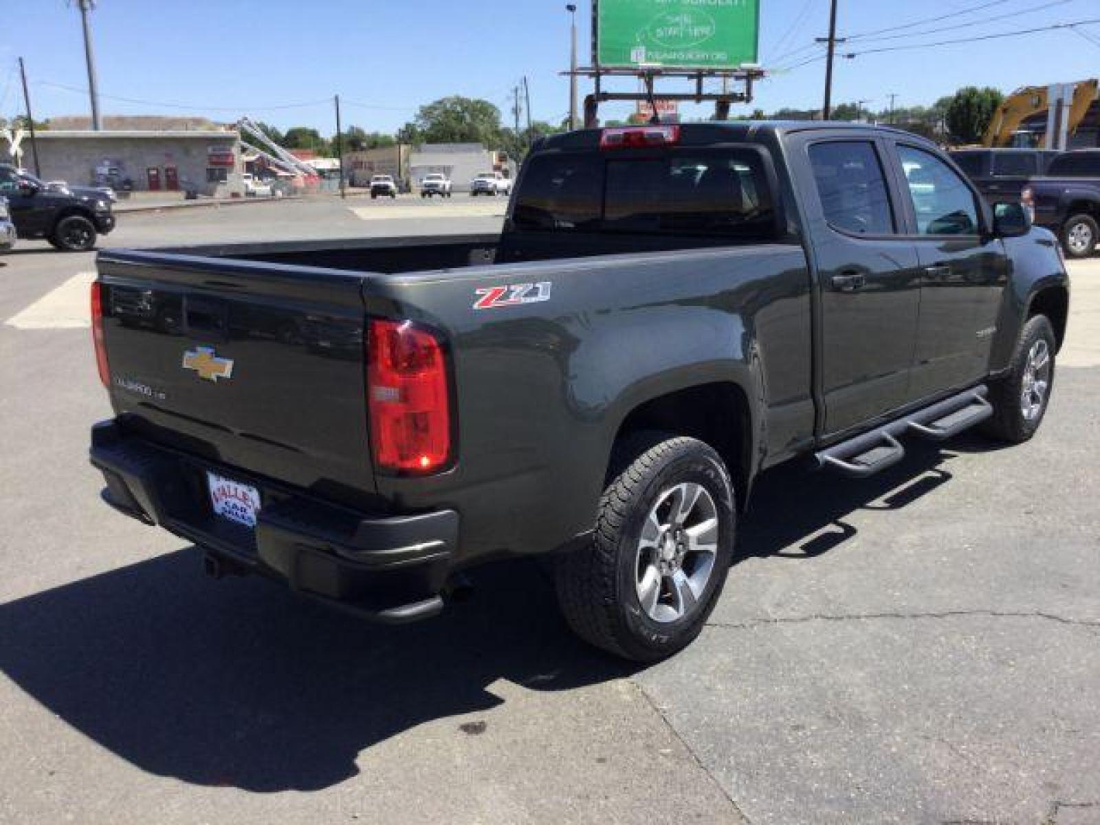 2018 Deepwood Green Metallic /Jet Black, leatherette/cloth Chevrolet Colorado Z71 Crew Cab 4WD Long Box (1GCGTDEN8J1) with an 3.6L V6 DOHC 24V GAS engine, 6-Speed Automatic transmission, located at 1801 Main Street, Lewiston, 83501, (208) 743-9371, 46.417065, -117.004799 - Photo #14
