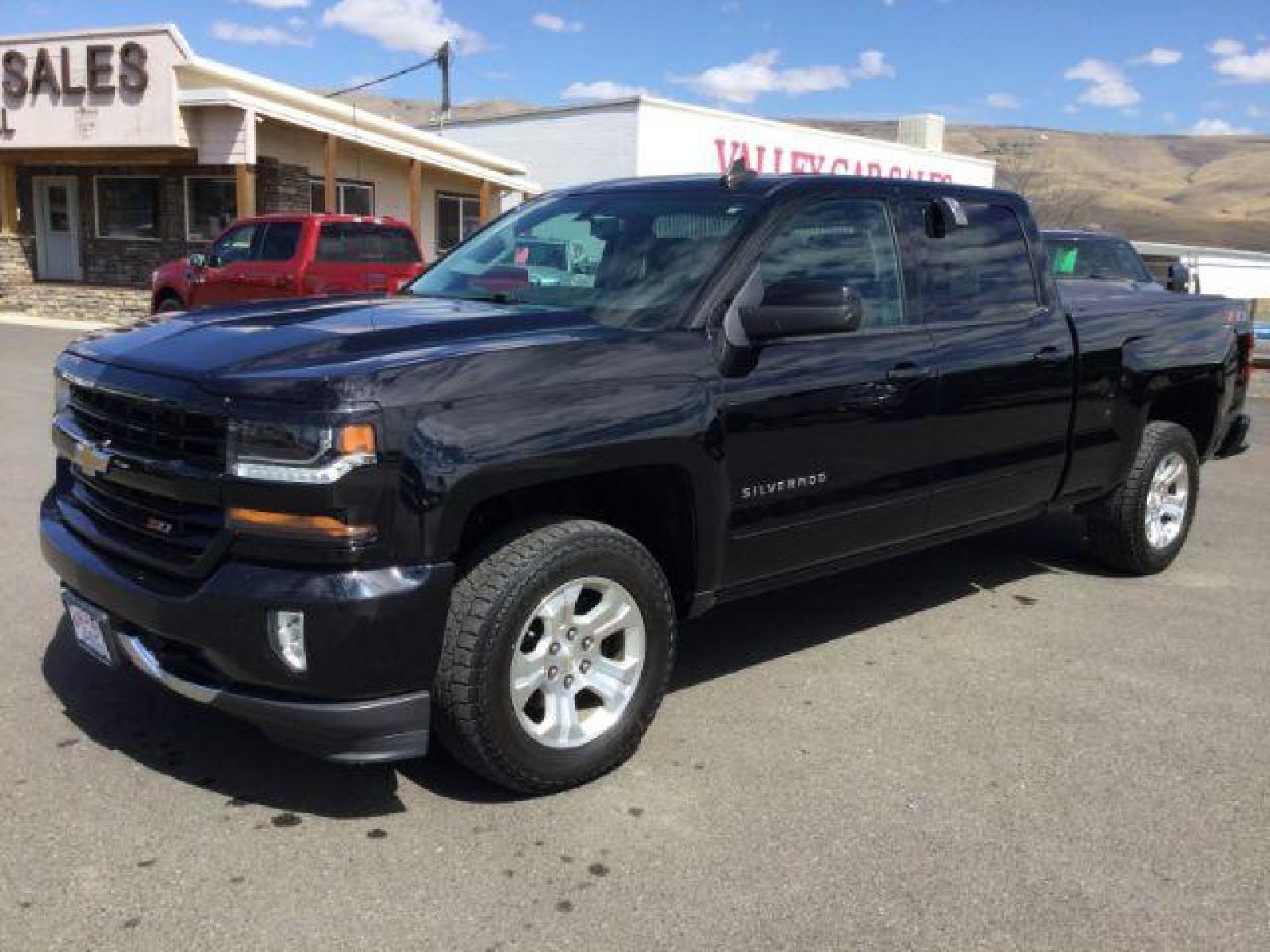 2018 Black /Jet Black, leather Chevrolet Silverado 1500 LT Crew Cab Long Box 4WD (1GCUKREC9JF) with an 5.3L V8 OHV 16V engine, 6-Speed Automatic transmission, located at 1801 Main Street, Lewiston, 83501, (208) 743-9371, 46.417065, -117.004799 - Photo #0