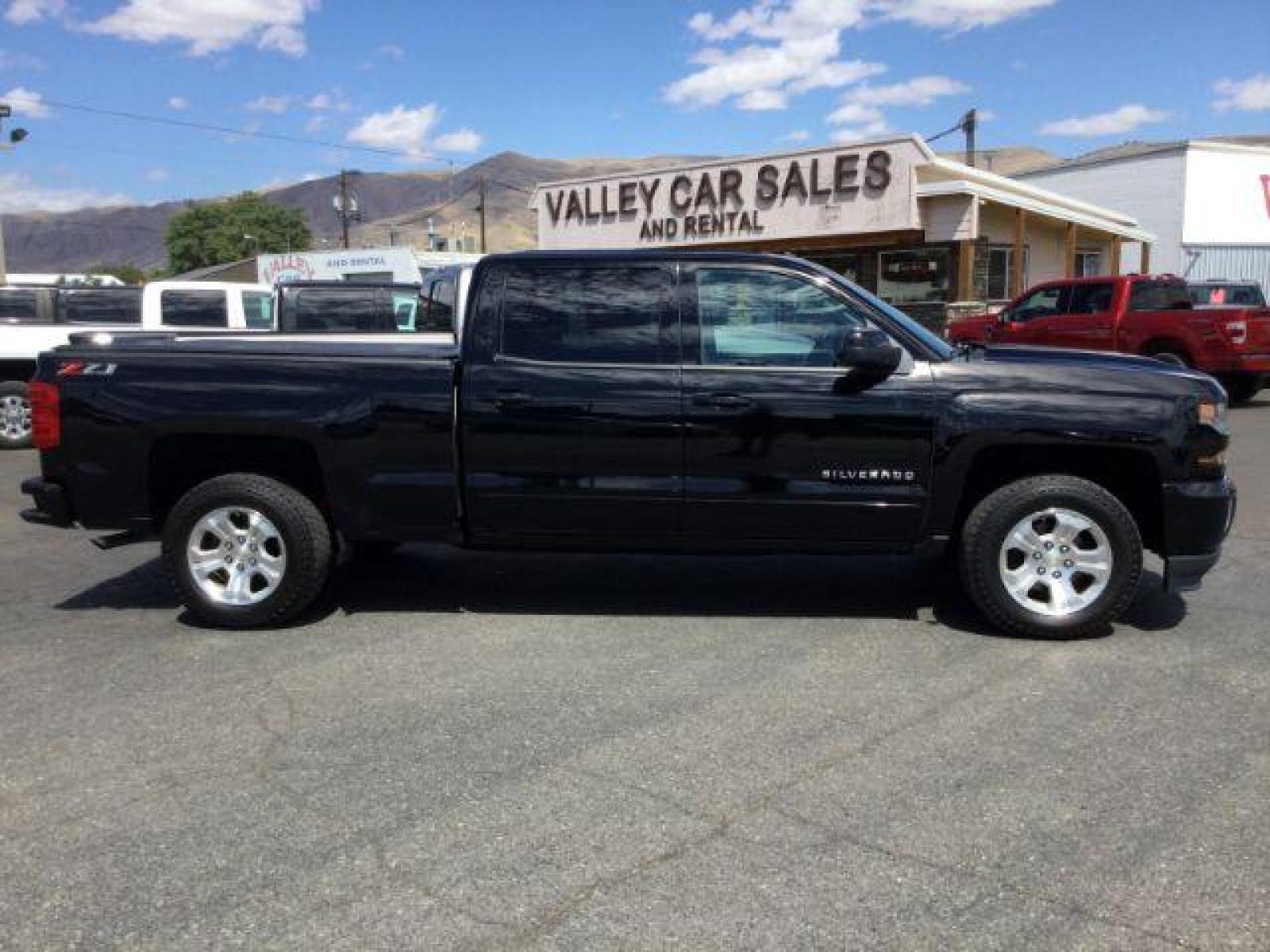 2018 Black /Jet Black, leather Chevrolet Silverado 1500 LT Crew Cab Long Box 4WD (1GCUKREC9JF) with an 5.3L V8 OHV 16V engine, 6-Speed Automatic transmission, located at 1801 Main Street, Lewiston, 83501, (208) 743-9371, 46.417065, -117.004799 - Photo #19