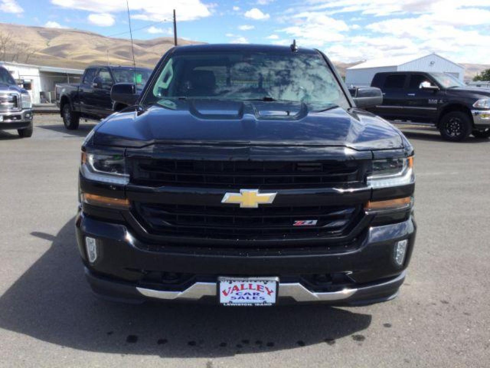 2018 Black /Jet Black, leather Chevrolet Silverado 1500 LT Crew Cab Long Box 4WD (1GCUKREC9JF) with an 5.3L V8 OHV 16V engine, 6-Speed Automatic transmission, located at 1801 Main Street, Lewiston, 83501, (208) 743-9371, 46.417065, -117.004799 - Photo #5