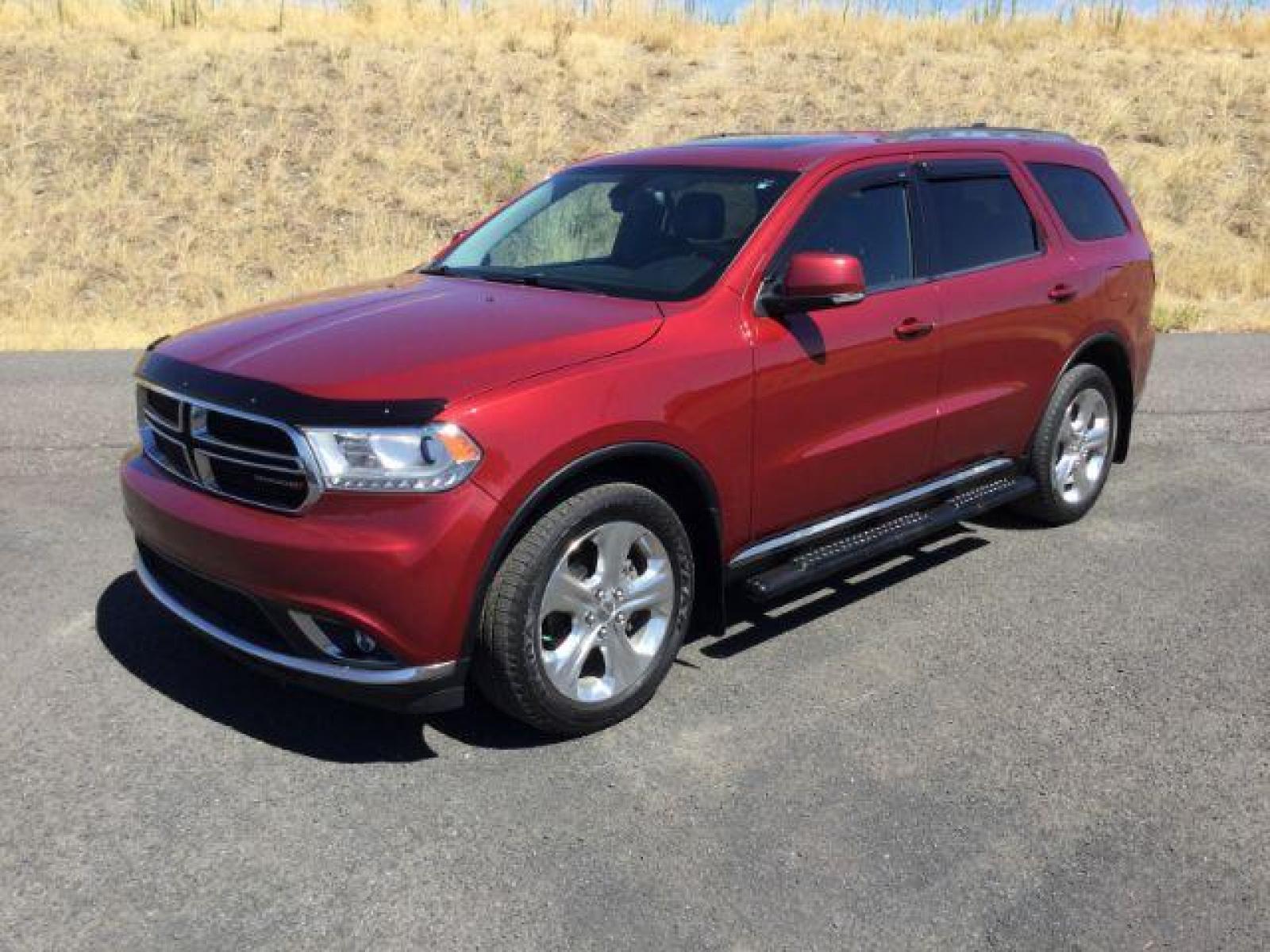 2014 Dp Cherry Red Crystal PC /Black Dodge Durango Limited AWD (1C4RDJDG8EC) with an 3.6L V6 DOHC 24V engine, 8-Speed Automatic transmission, located at 1801 Main Street, Lewiston, 83501, (208) 743-9371, 46.417065, -117.004799 - Photo #0