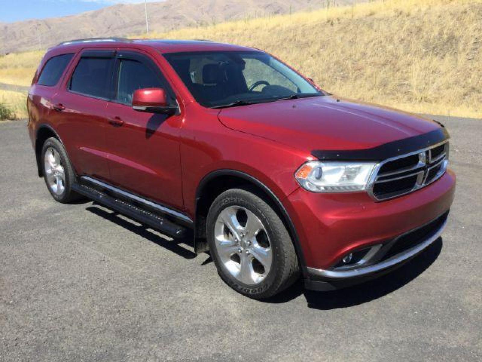 2014 Dp Cherry Red Crystal PC /Black Dodge Durango Limited AWD (1C4RDJDG8EC) with an 3.6L V6 DOHC 24V engine, 8-Speed Automatic transmission, located at 1801 Main Street, Lewiston, 83501, (208) 743-9371, 46.417065, -117.004799 - Photo #14
