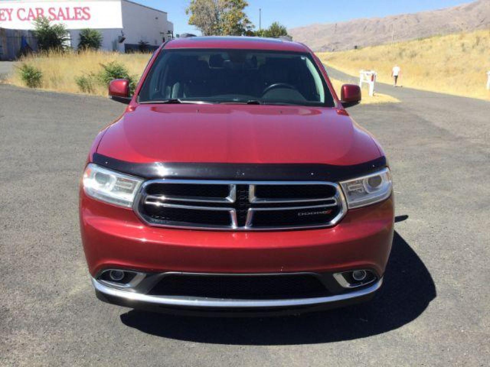 2014 Dp Cherry Red Crystal PC /Black Dodge Durango Limited AWD (1C4RDJDG8EC) with an 3.6L V6 DOHC 24V engine, 8-Speed Automatic transmission, located at 1801 Main Street, Lewiston, 83501, (208) 743-9371, 46.417065, -117.004799 - Photo #4