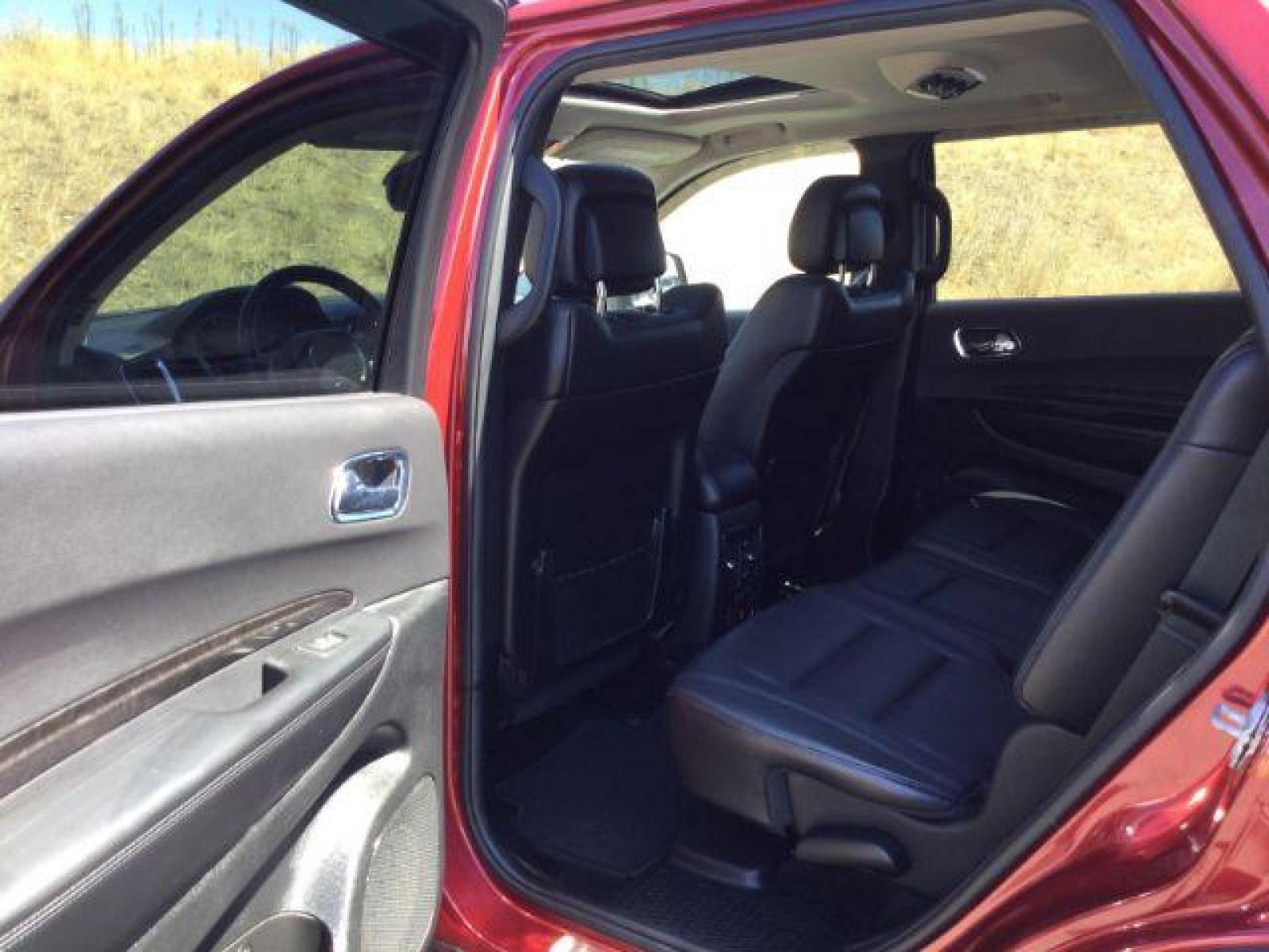 2014 Dp Cherry Red Crystal PC /Black Dodge Durango Limited AWD (1C4RDJDG8EC) with an 3.6L V6 DOHC 24V engine, 8-Speed Automatic transmission, located at 1801 Main Street, Lewiston, 83501, (208) 743-9371, 46.417065, -117.004799 - Photo #7