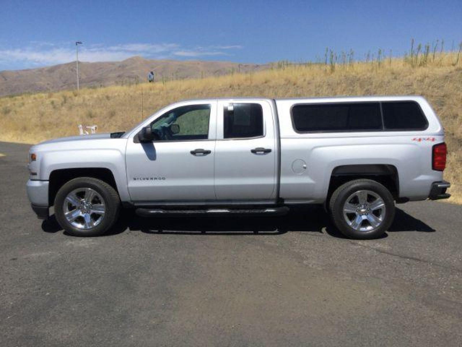 2017 Silver Ice Metallic /GRAY CLOTH Chevrolet Silverado 1500 Custom Double Cab 4WD (1GCVKPEC8HZ) with an 5.3L V8 OHV 16V engine, 6-Speed Automatic transmission, located at 1801 Main Street, Lewiston, 83501, (208) 743-9371, 46.417065, -117.004799 - Photo #1