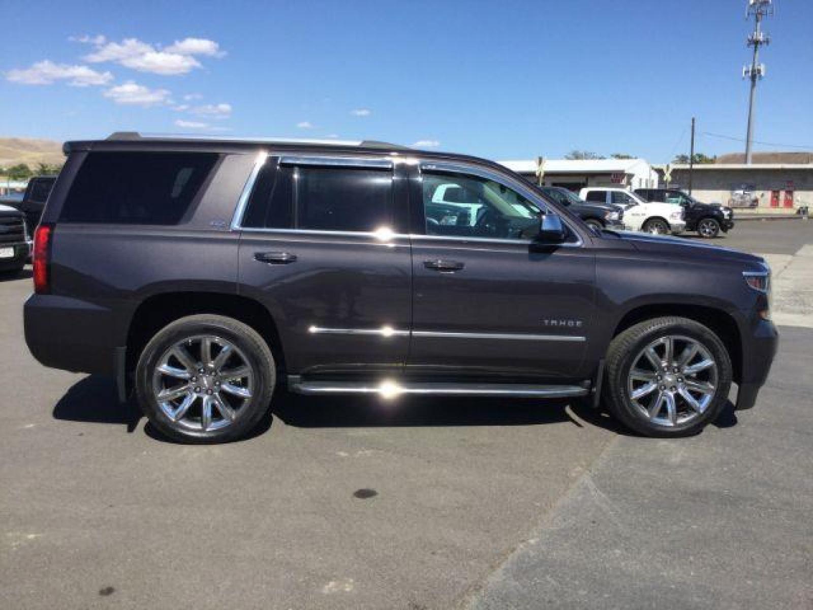 2015 GRAY /Medium Brown Leather Chevrolet Tahoe LTZ 4WD (1GNSKCKC8FR) with an 5.3L V8 OHV 16V engine, 6-Speed Automatic transmission, located at 1801 Main Street, Lewiston, 83501, (208) 743-9371, 46.417065, -117.004799 - Photo #14