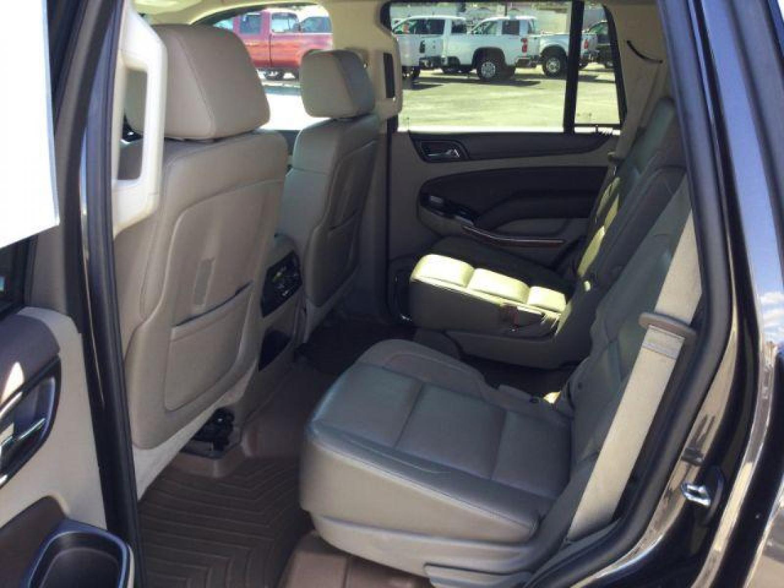2015 GRAY /Medium Brown Leather Chevrolet Tahoe LTZ 4WD (1GNSKCKC8FR) with an 5.3L V8 OHV 16V engine, 6-Speed Automatic transmission, located at 1801 Main Street, Lewiston, 83501, (208) 743-9371, 46.417065, -117.004799 - Photo #5