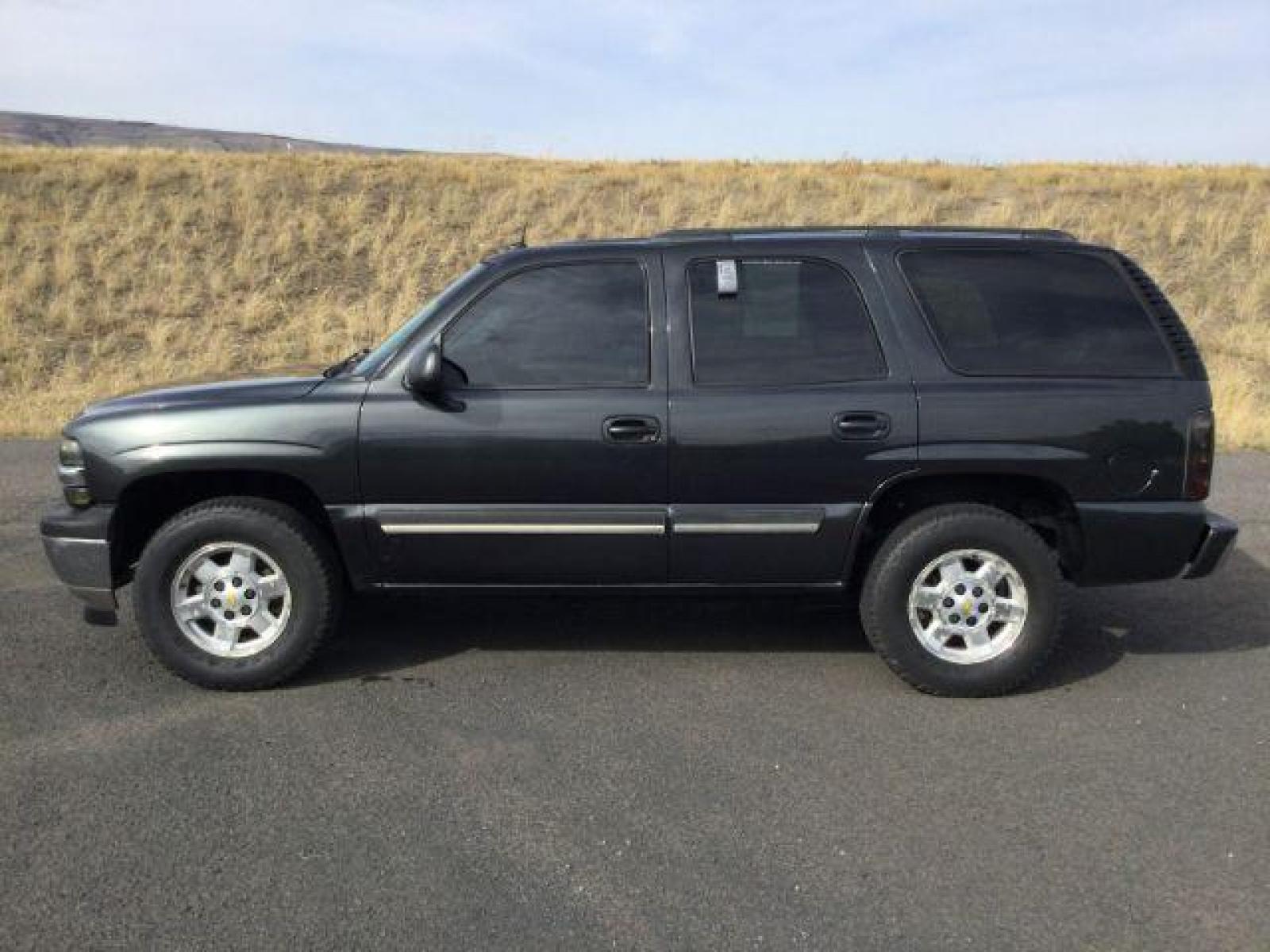 2005 Dark Gray Metallic /Tan/Neutral Cloth Interior Chevrolet Tahoe 2WD (1GNEC13T05R) with an 5.3L V8 OHV 16V engine, 4-Speed Automatic transmission, located at 1801 Main Street, Lewiston, 83501, (208) 743-9371, 46.417065, -117.004799 - Photo #1