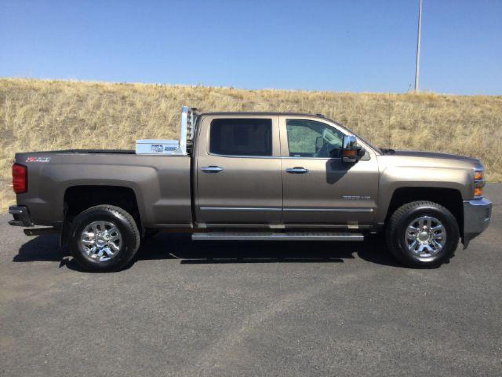 2015 Brownstone Metallic /Cocoa/Dune Chevrolet Silverado 3500HD LTZ Crew Cab 4WD (1GC1K0EG6FF) with an 6.0L V8 OHV 16V FFV engine, 6-Speed Automatic transmission, located at 1801 Main Street, Lewiston, 83501, (208) 743-9371, 46.417065, -117.004799 - Photo #8