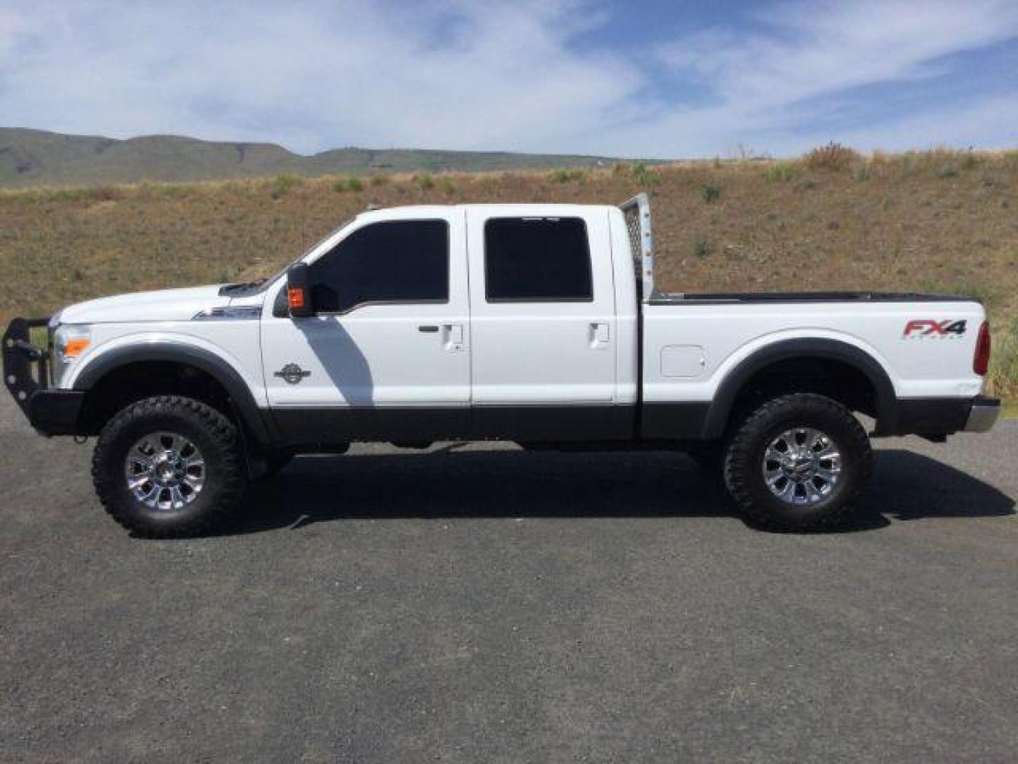 2015 Oxford White/Gray /Black Leather Ford F-350 SD Lariat Crew Cab 4WD (1FT8W3BT2FE) with an 6.7L V8 OHV 16V DIESEL engine, 6-Speed Automatic transmission, located at 1801 Main Street, Lewiston, 83501, (208) 743-9371, 46.417065, -117.004799 - Photo#1