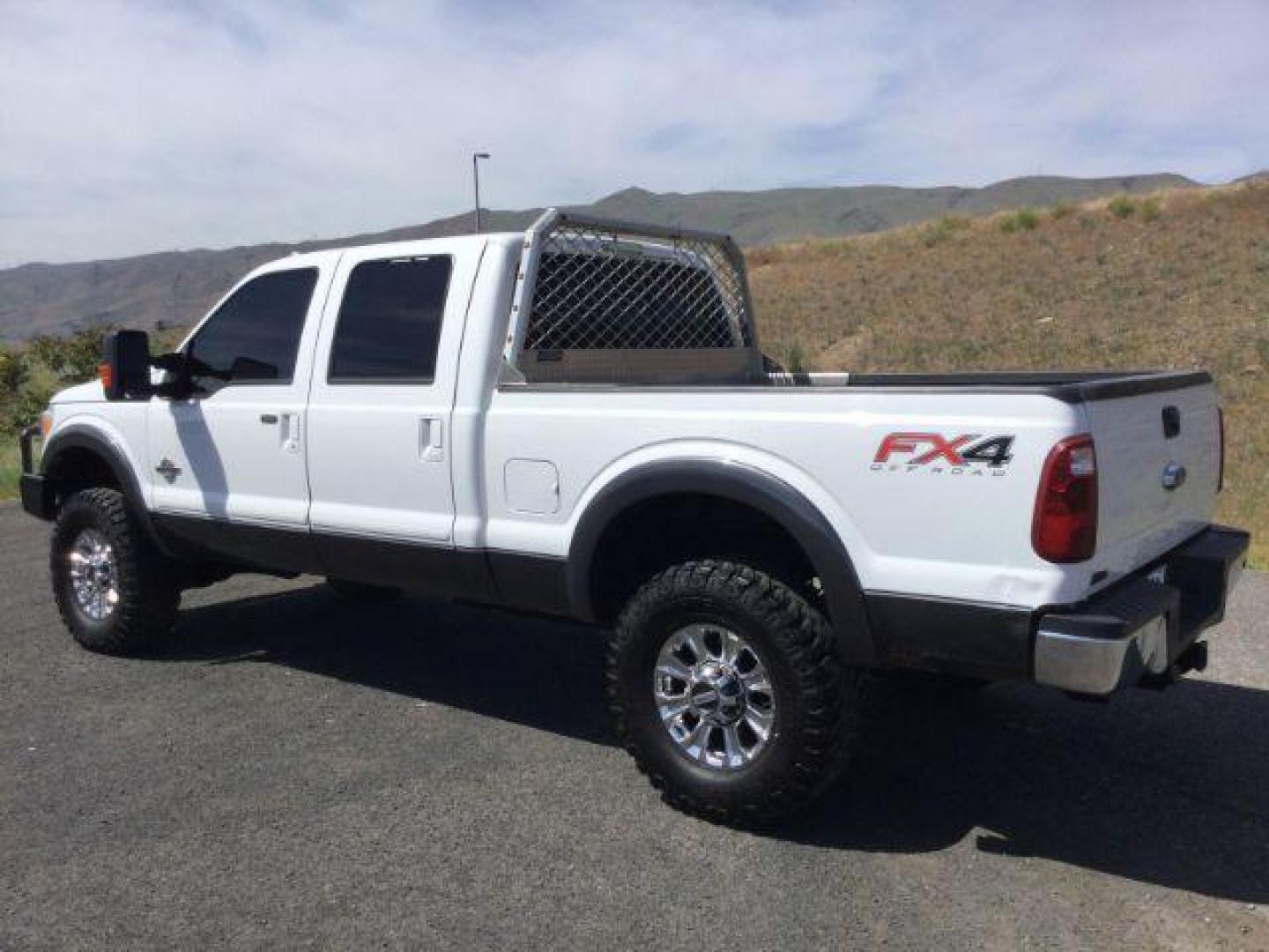 2015 Oxford White/Gray /Black Leather Ford F-350 SD Lariat Crew Cab 4WD (1FT8W3BT2FE) with an 6.7L V8 OHV 16V DIESEL engine, 6-Speed Automatic transmission, located at 1801 Main Street, Lewiston, 83501, (208) 743-9371, 46.417065, -117.004799 - Photo#2