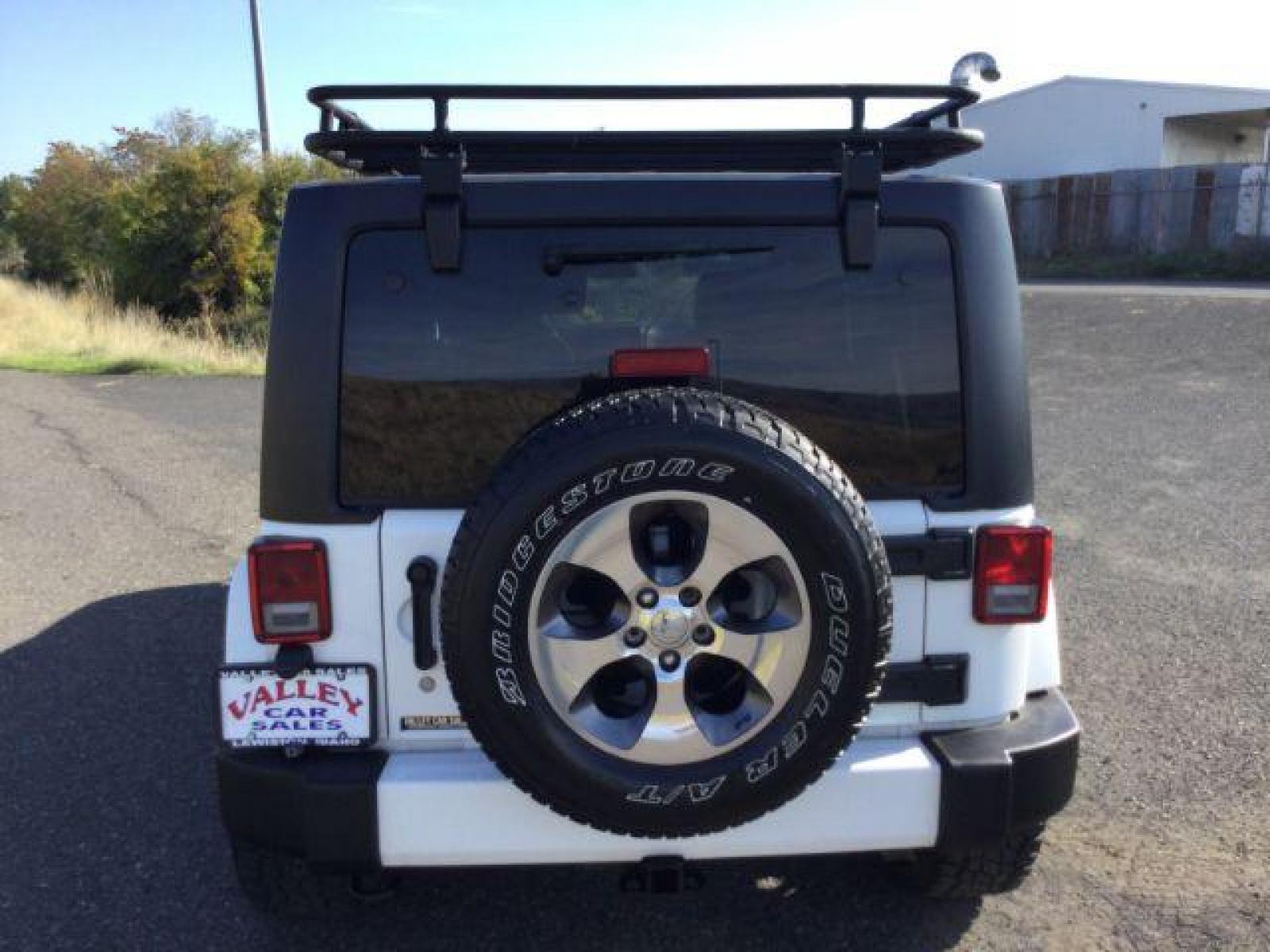 2016 Bright White Clear Coat /Black, leather Jeep Wrangler Unlimited Sahara 4WD (1C4BJWEG3GL) with an 3.6L V6 DOHC 24V FFV engine, 5-Speed Automatic transmission, located at 1801 Main Street, Lewiston, 83501, (208) 743-9371, 46.417065, -117.004799 - Photo #13