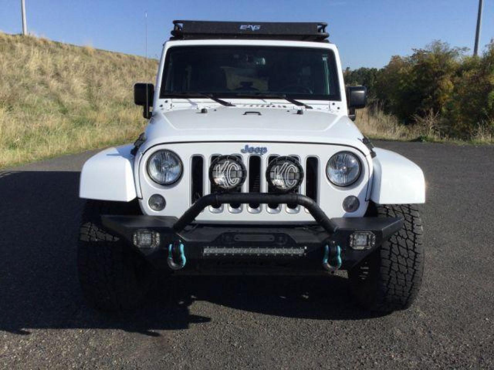 2016 Bright White Clear Coat /Black, leather Jeep Wrangler Unlimited Sahara 4WD (1C4BJWEG3GL) with an 3.6L V6 DOHC 24V FFV engine, 5-Speed Automatic transmission, located at 1801 Main Street, Lewiston, 83501, (208) 743-9371, 46.417065, -117.004799 - Photo #2