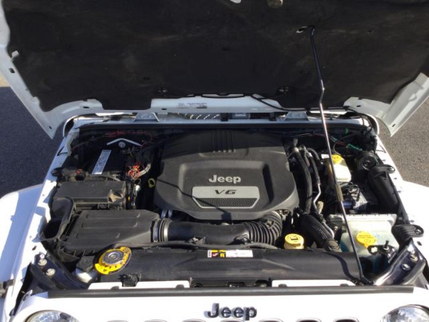 2016 Bright White Clear Coat /Black, leather Jeep Wrangler Unlimited Sahara 4WD (1C4BJWEG3GL) with an 3.6L V6 DOHC 24V FFV engine, 5-Speed Automatic transmission, located at 1801 Main Street, Lewiston, 83501, (208) 743-9371, 46.417065, -117.004799- Photo#3