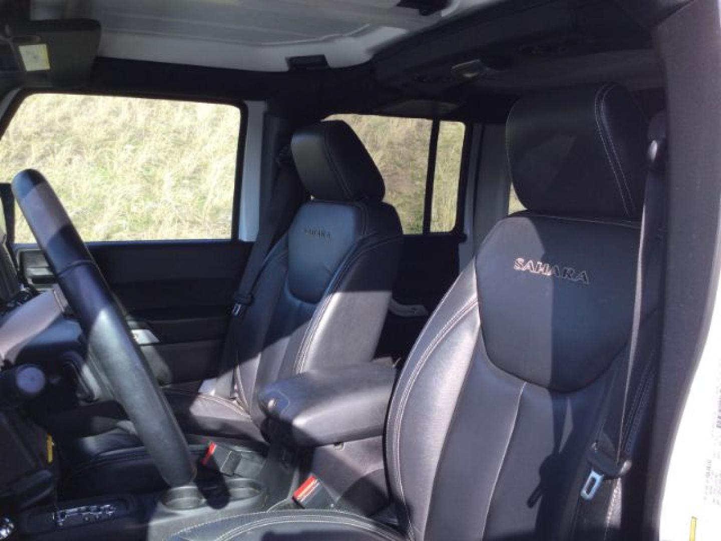 2016 Bright White Clear Coat /Black, leather Jeep Wrangler Unlimited Sahara 4WD (1C4BJWEG3GL) with an 3.6L V6 DOHC 24V FFV engine, 5-Speed Automatic transmission, located at 1801 Main Street, Lewiston, 83501, (208) 743-9371, 46.417065, -117.004799- Photo#6