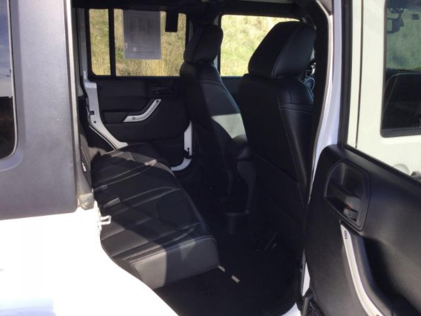 2016 Bright White Clear Coat /Black, leather Jeep Wrangler Unlimited Sahara 4WD (1C4BJWEG3GL) with an 3.6L V6 DOHC 24V FFV engine, 5-Speed Automatic transmission, located at 1801 Main Street, Lewiston, 83501, (208) 743-9371, 46.417065, -117.004799- Photo#18