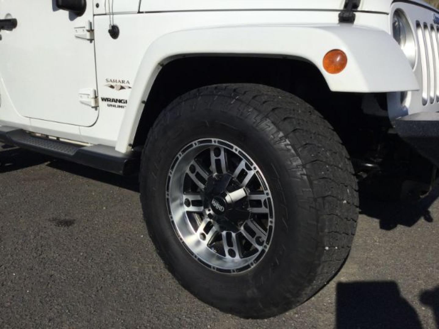 2016 Bright White Clear Coat /Black, leather Jeep Wrangler Unlimited Sahara 4WD (1C4BJWEG3GL) with an 3.6L V6 DOHC 24V FFV engine, 5-Speed Automatic transmission, located at 1801 Main Street, Lewiston, 83501, (208) 743-9371, 46.417065, -117.004799- Photo#20