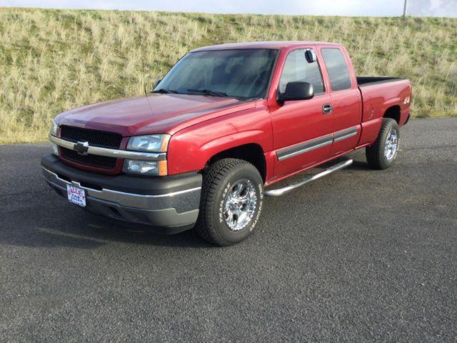 2005 Sport Red Metallic /Dark Charcoal Cloth Interior Chevrolet Silverado 1500 Ext. Cab Short Bed 4WD (2GCEK19VX51) with an 4.8L V8 OHV 16V engine, 4-Speed Automatic transmission, located at 1801 Main Street, Lewiston, 83501, (208) 743-9371, 46.417065, -117.004799 - Photo #0