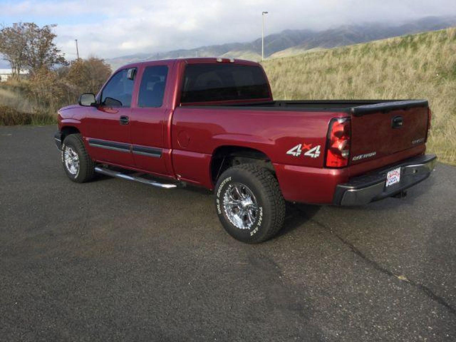 2005 Sport Red Metallic /Dark Charcoal Cloth Interior Chevrolet Silverado 1500 Ext. Cab Short Bed 4WD (2GCEK19VX51) with an 4.8L V8 OHV 16V engine, 4-Speed Automatic transmission, located at 1801 Main Street, Lewiston, 83501, (208) 743-9371, 46.417065, -117.004799 - Photo #1