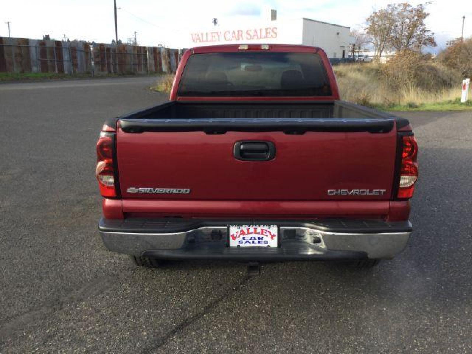 2005 Sport Red Metallic /Dark Charcoal Cloth Interior Chevrolet Silverado 1500 Ext. Cab Short Bed 4WD (2GCEK19VX51) with an 4.8L V8 OHV 16V engine, 4-Speed Automatic transmission, located at 1801 Main Street, Lewiston, 83501, (208) 743-9371, 46.417065, -117.004799 - Photo #2