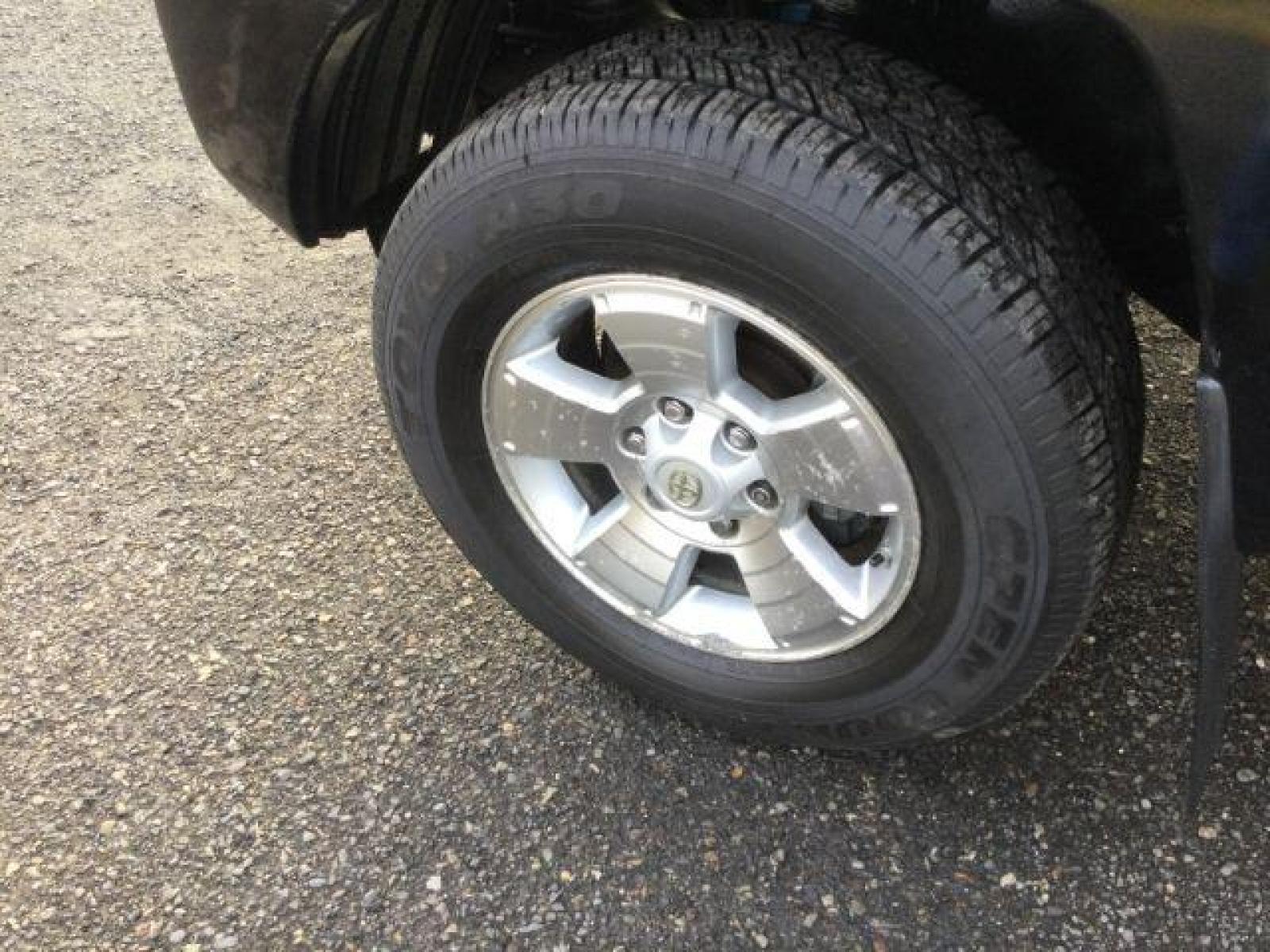 2012 Black /Graphite Cloth Interior Toyota Tacoma Double Cab Long Bed V6 Auto 4WD (3TMMU4FN1CM) with an 4.0L V6 DOHC 24V engine, 5-Speed Automatic transmission, located at 1801 Main Street, Lewiston, 83501, (208) 743-9371, 46.417065, -117.004799 - Photo #11