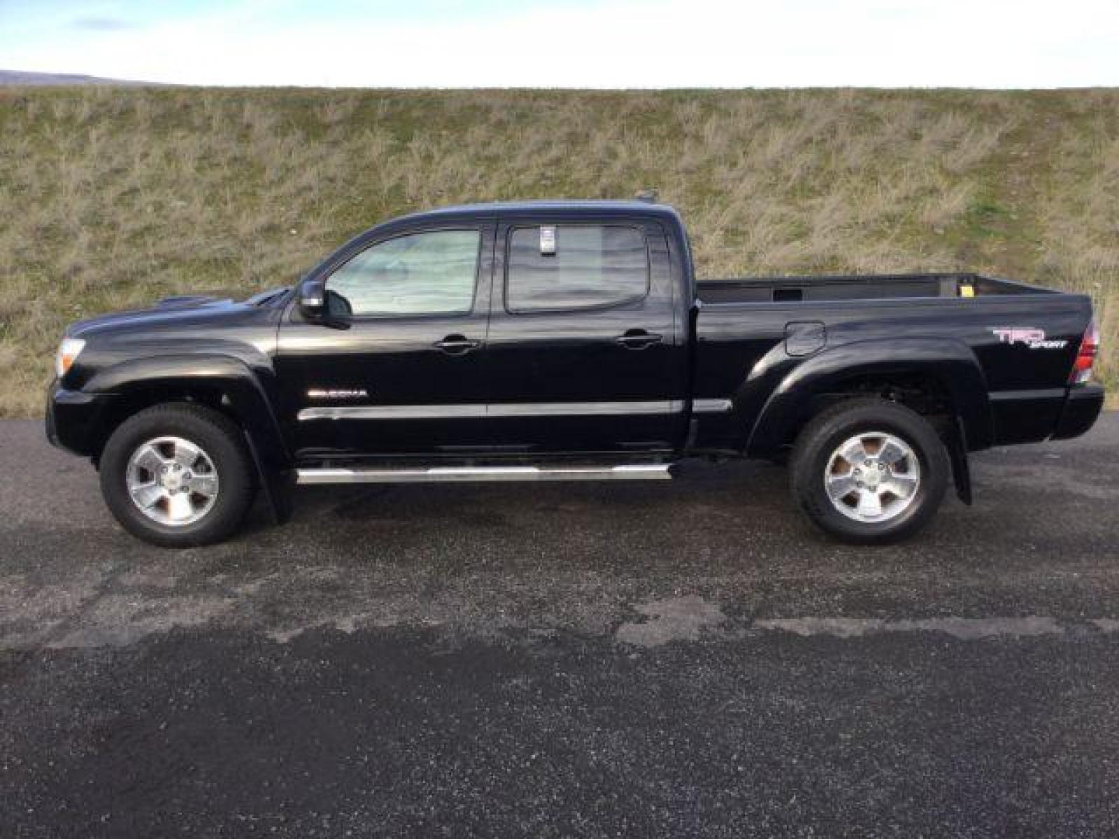 2012 Black /Graphite Cloth Interior Toyota Tacoma Double Cab Long Bed V6 Auto 4WD (3TMMU4FN1CM) with an 4.0L V6 DOHC 24V engine, 5-Speed Automatic transmission, located at 1801 Main Street, Lewiston, 83501, (208) 743-9371, 46.417065, -117.004799 - Photo #1