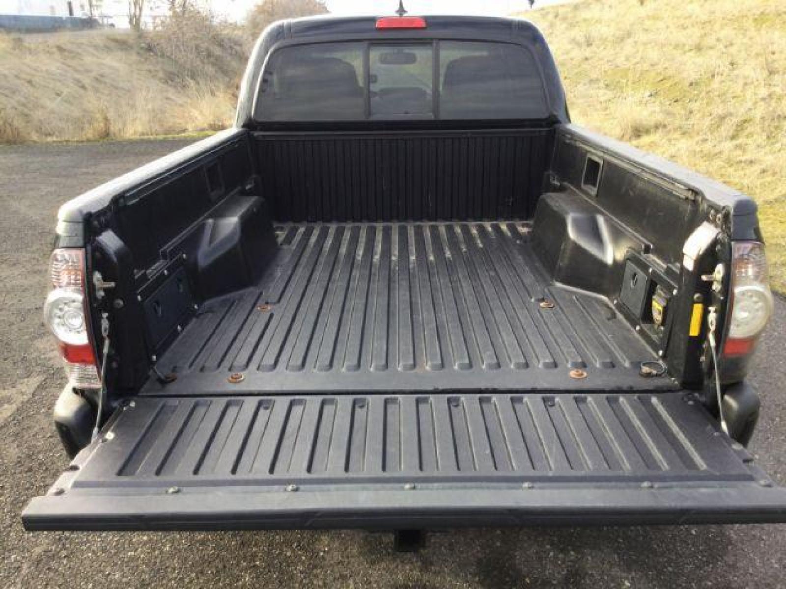 2012 Black /Graphite Cloth Interior Toyota Tacoma Double Cab Long Bed V6 Auto 4WD (3TMMU4FN1CM) with an 4.0L V6 DOHC 24V engine, 5-Speed Automatic transmission, located at 1801 Main Street, Lewiston, 83501, (208) 743-9371, 46.417065, -117.004799 - Photo #7