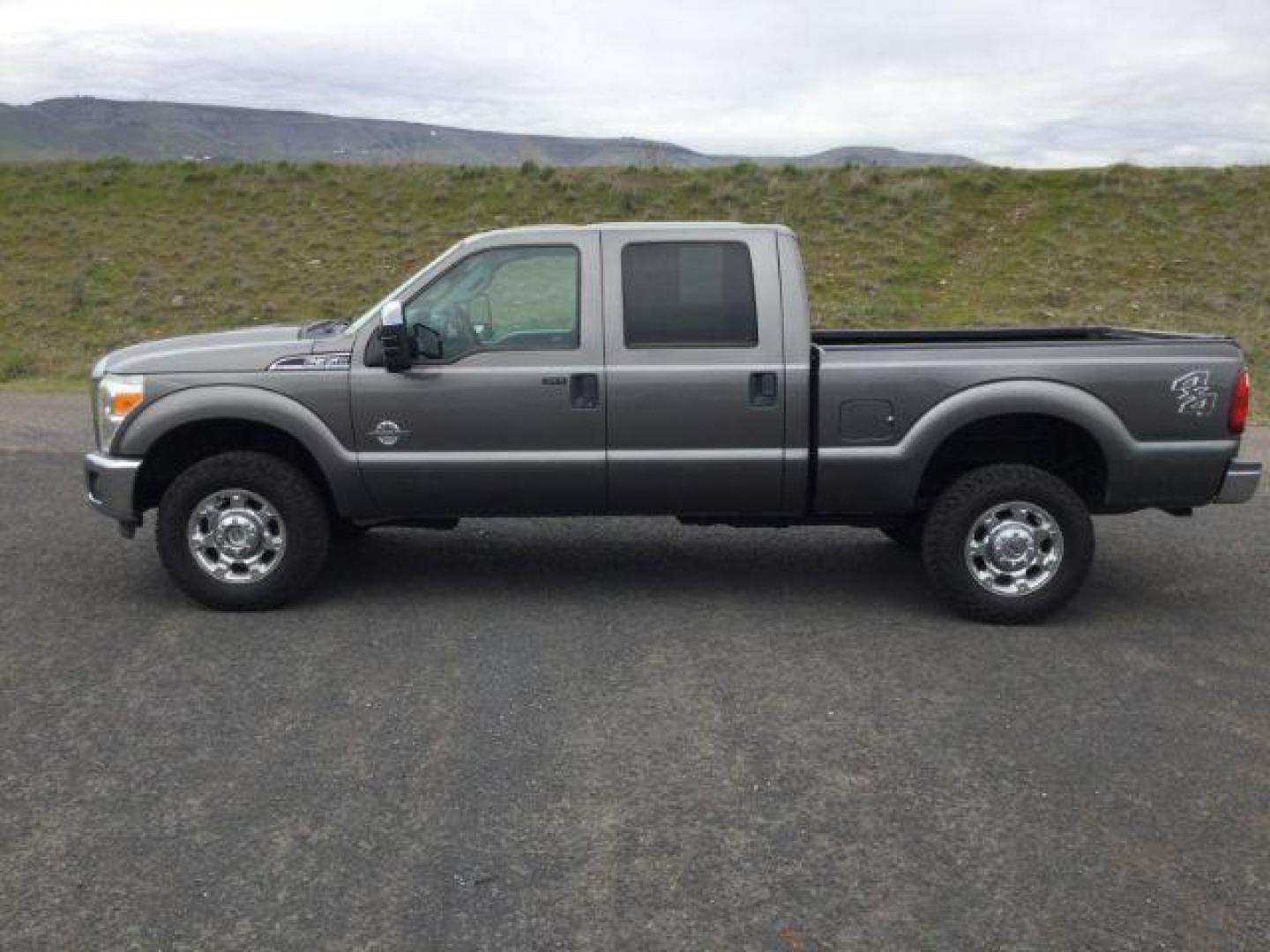 2014 Sterling Gray Metallic /Steel Ford F-350 SD XLT Crew Cab 4WD (1FT8W3BT3EE) with an 6.7L V8 OHV 16V DIESEL engine, 6-Speed Automatic transmission, located at 1801 Main Street, Lewiston, 83501, (208) 743-9371, 46.417065, -117.004799 - Photo#1