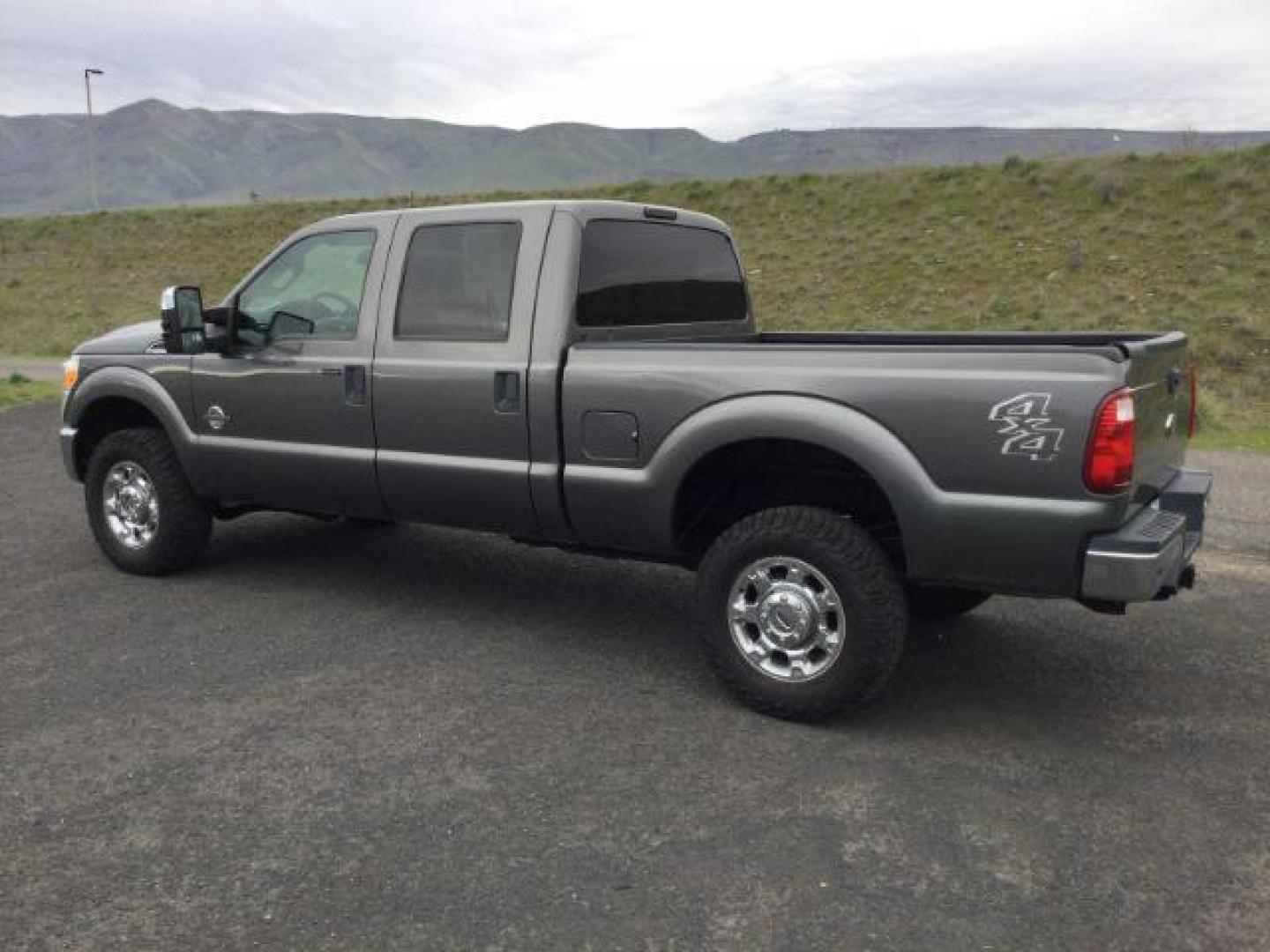 2014 Sterling Gray Metallic /Steel Ford F-350 SD XLT Crew Cab 4WD (1FT8W3BT3EE) with an 6.7L V8 OHV 16V DIESEL engine, 6-Speed Automatic transmission, located at 1801 Main Street, Lewiston, 83501, (208) 743-9371, 46.417065, -117.004799 - Photo#2