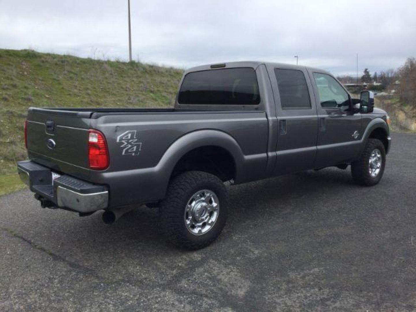 2014 Sterling Gray Metallic /Steel Ford F-350 SD XLT Crew Cab 4WD (1FT8W3BT3EE) with an 6.7L V8 OHV 16V DIESEL engine, 6-Speed Automatic transmission, located at 1801 Main Street, Lewiston, 83501, (208) 743-9371, 46.417065, -117.004799 - Photo#13