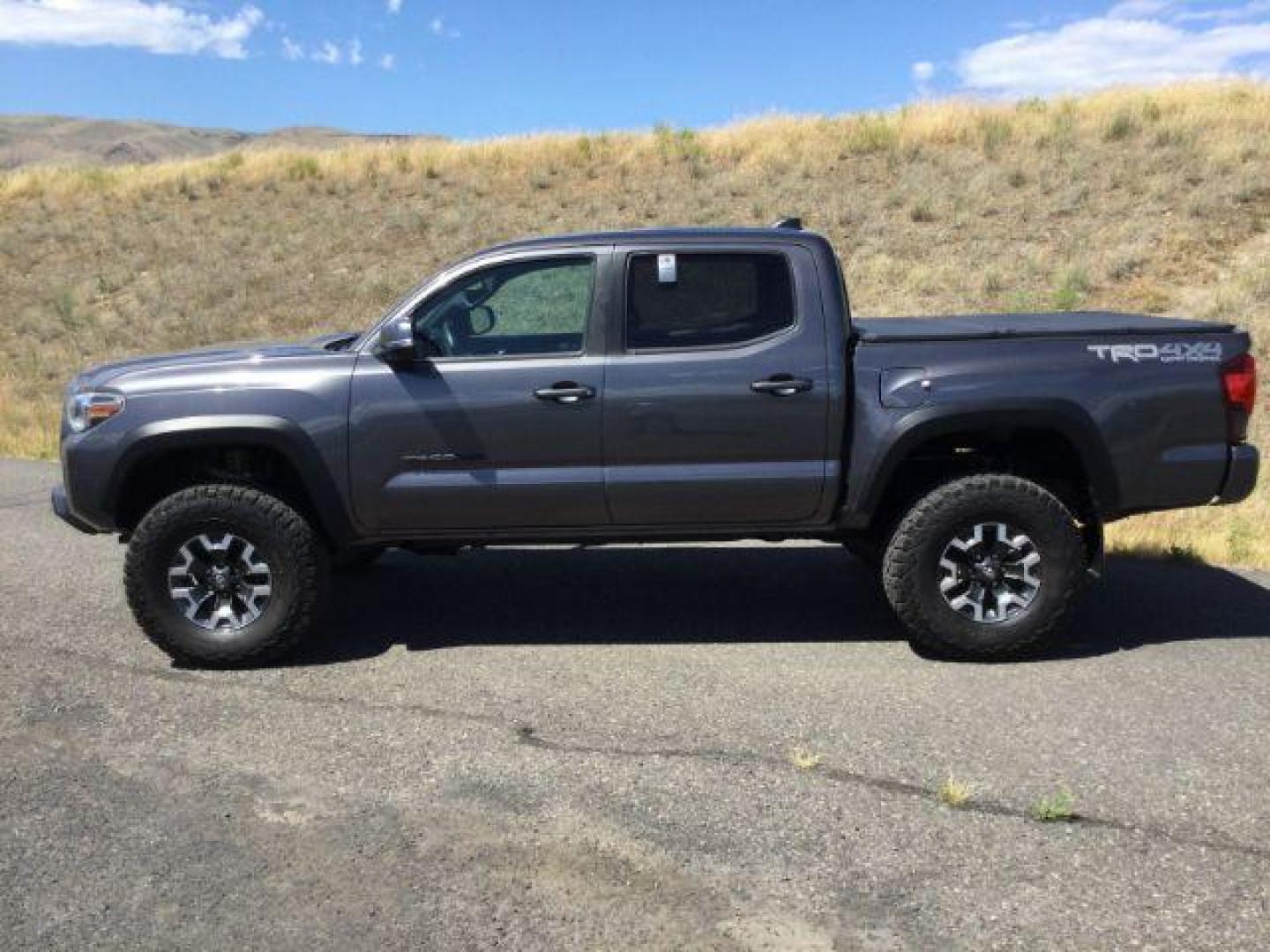 2019 Toyota Tacoma SR5 Double Cab Long Bed V6 6AT 4WD (5TFCZ5AN2KX) with an 3.5L V6 DOHC 24V engine, 6-Speed Automatic transmission, located at 1801 Main Street, Lewiston, 83501, (208) 743-9371, 46.417065, -117.004799 - Photo#1