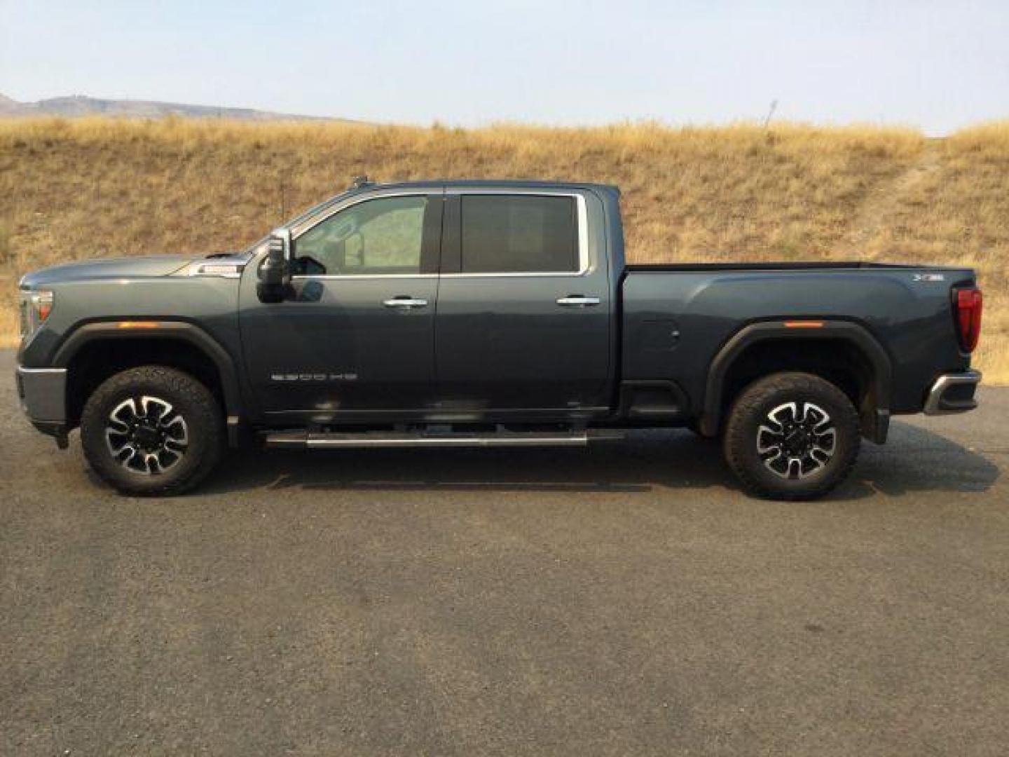 2020 Dark Sky Metallic /Jet Black, leather GMC Sierra 2500HD SLT Crew Cab 4WD (1GT49NEY1LF) with an 6.6L V8 OHV 16 DIESEL engine, 10-speed automatic transmission, located at 1801 Main Street, Lewiston, 83501, (208) 743-9371, 46.417065, -117.004799 - Photo#1