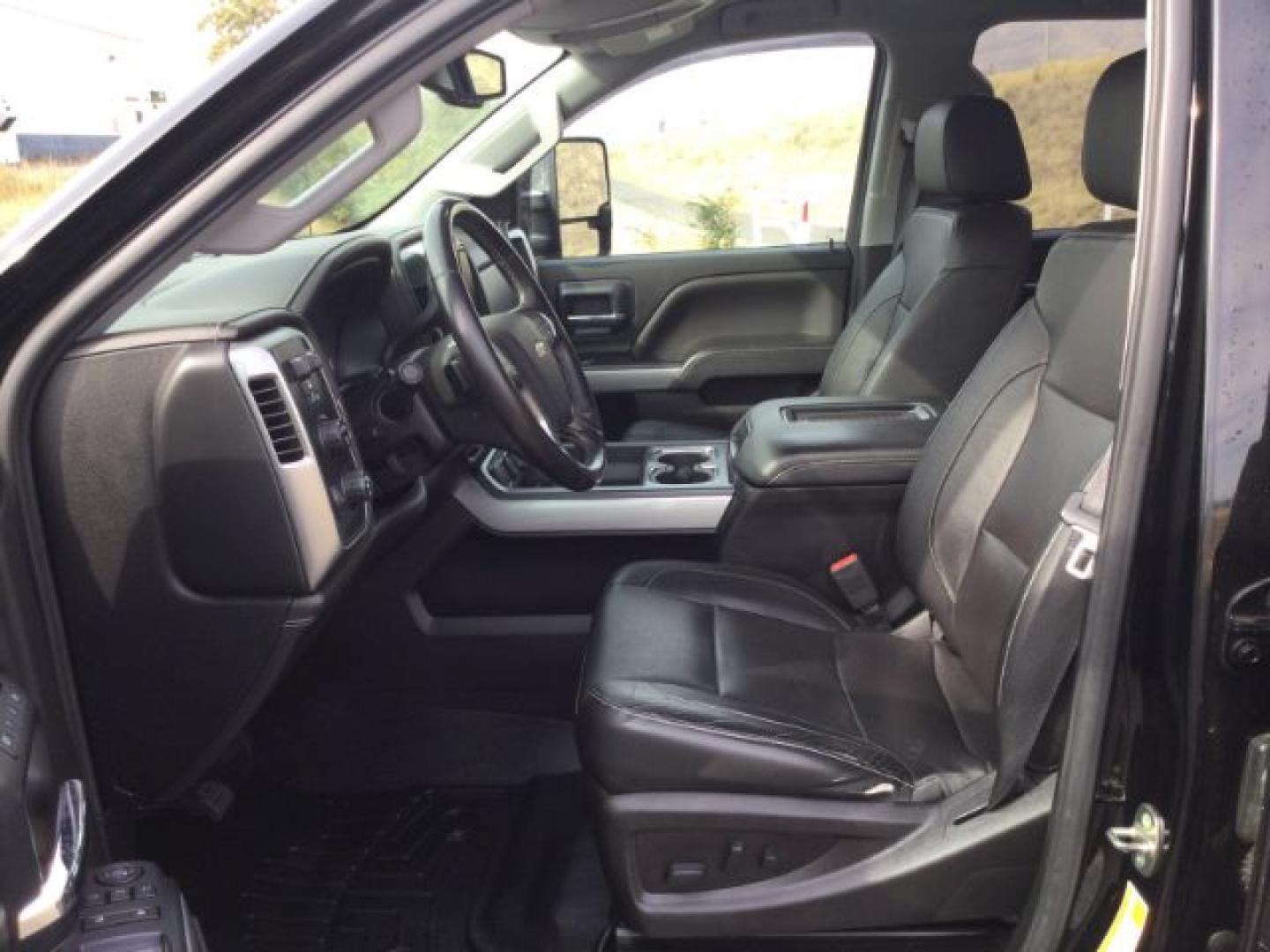 2018 Black /Jet Black, leather Chevrolet Silverado 2500HD LTZ Crew Cab 4WD (1GC1KWEG9JF) with an 6.0L V8 OHV 16V FFV engine, 6-Speed Automatic transmission, located at 1801 Main Street, Lewiston, 83501, (208) 743-9371, 46.417065, -117.004799- Photo#4