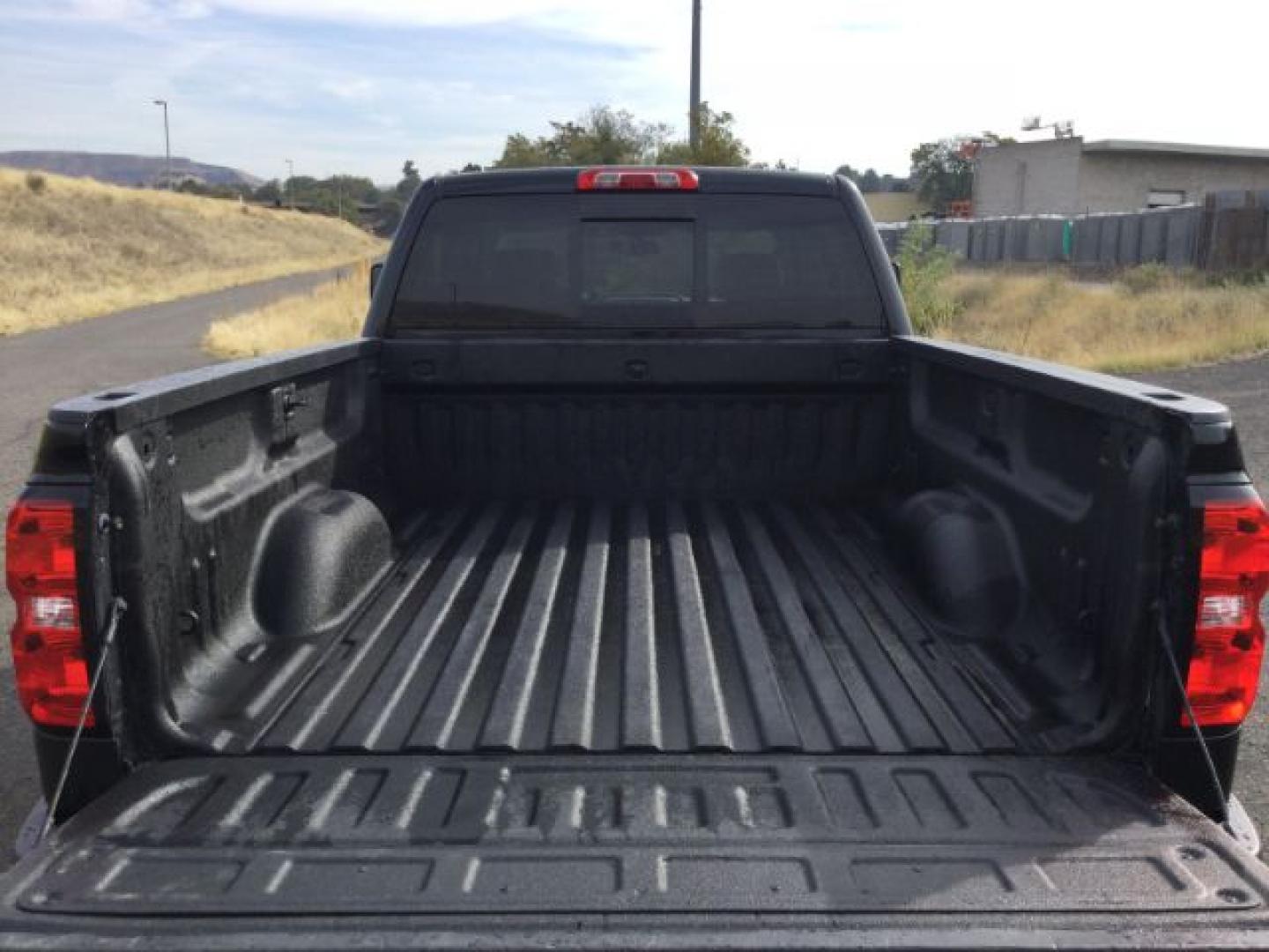 2018 Black /Jet Black, leather Chevrolet Silverado 2500HD LTZ Crew Cab 4WD (1GC1KWEG9JF) with an 6.0L V8 OHV 16V FFV engine, 6-Speed Automatic transmission, located at 1801 Main Street, Lewiston, 83501, (208) 743-9371, 46.417065, -117.004799- Photo#13