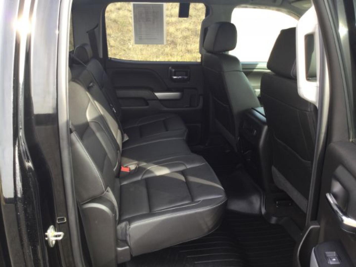 2018 Black /Jet Black, leather Chevrolet Silverado 2500HD LTZ Crew Cab 4WD (1GC1KWEG9JF) with an 6.0L V8 OHV 16V FFV engine, 6-Speed Automatic transmission, located at 1801 Main Street, Lewiston, 83501, (208) 743-9371, 46.417065, -117.004799- Photo#15