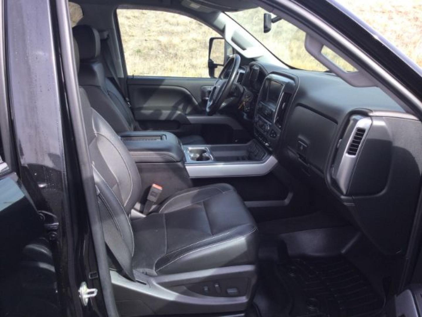 2018 Black /Jet Black, leather Chevrolet Silverado 2500HD LTZ Crew Cab 4WD (1GC1KWEG9JF) with an 6.0L V8 OHV 16V FFV engine, 6-Speed Automatic transmission, located at 1801 Main Street, Lewiston, 83501, (208) 743-9371, 46.417065, -117.004799- Photo#16