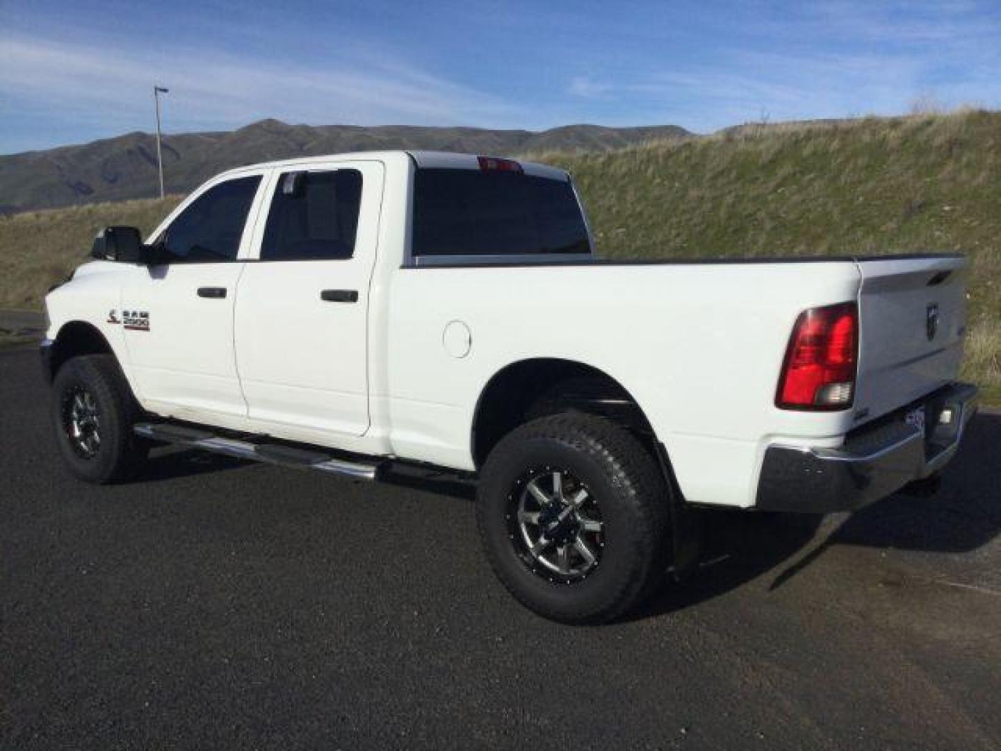 2018 Bright White Clear Coat /Black/Diesel Gray, cloth RAM 2500 Tradesman Crew Cab SWB 4WD (3C6UR5CL4JG) with an 6.7L L6 OHV 24V TURBO DIESEL engine, 6-Speed Automatic transmission, located at 1801 Main Street, Lewiston, 83501, (208) 743-9371, 46.417065, -117.004799 - Photo#2