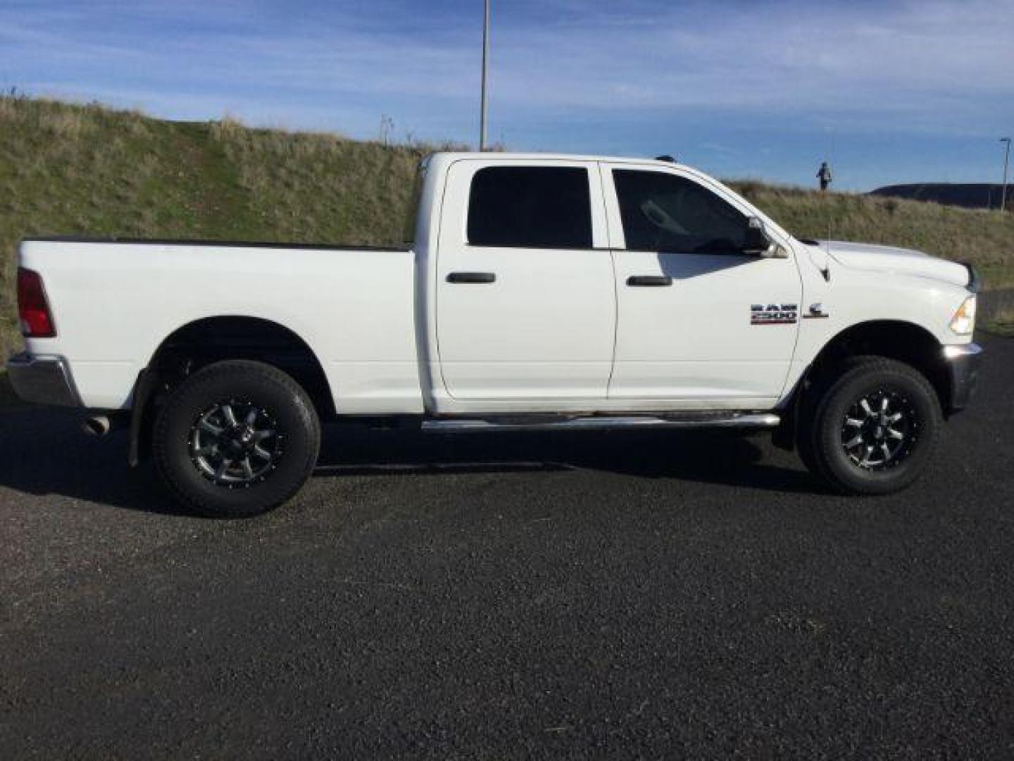 2018 Bright White Clear Coat /Black/Diesel Gray, cloth RAM 2500 Tradesman Crew Cab SWB 4WD (3C6UR5CL4JG) with an 6.7L L6 OHV 24V TURBO DIESEL engine, 6-Speed Automatic transmission, located at 1801 Main Street, Lewiston, 83501, (208) 743-9371, 46.417065, -117.004799 - Photo#15