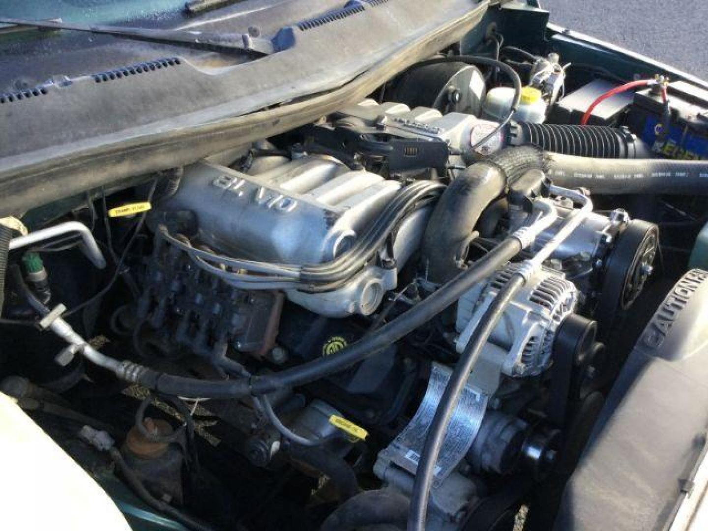1999 Emerald Green Pearl Coat /Agate Cloth Dodge Ram 2500 Quad Cab Long Bed 4WD (3B7KF23W2XG) with an 8.0L V10 OHV 20V engine, 4-Speed Automatic transmission, located at 1801 Main Street, Lewiston, 83501, (208) 743-9371, 46.417065, -117.004799 - Photo#11