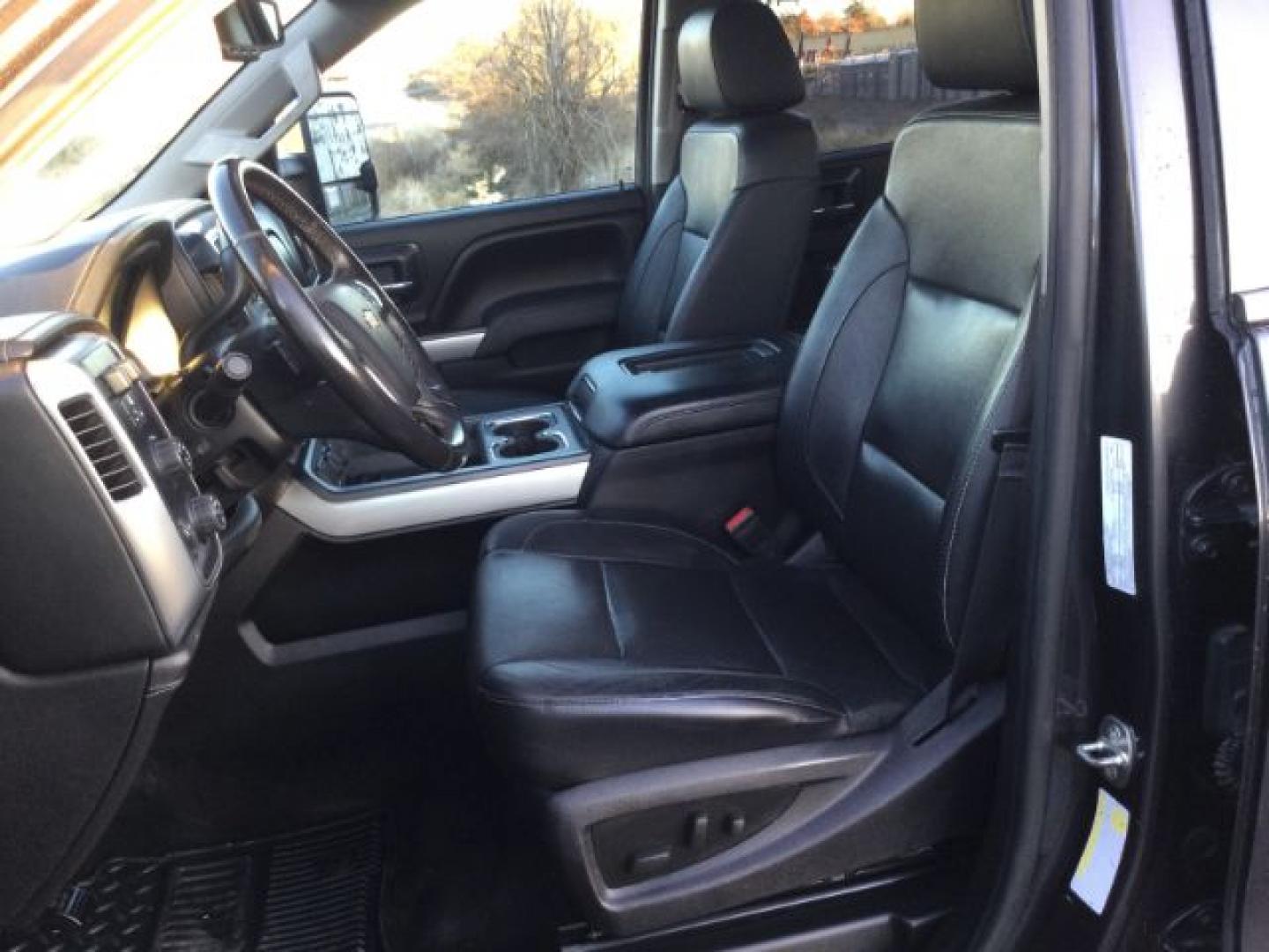 2016 Graystone Metallic /Black Leather Chevrolet Silverado 3500HD LTZ CREW CAB 4X4 (1GC4K0E85GF) with an Duramax 6.6L V-8 diesel direct injection engine, 6-Speed Automatic transmission, located at 1801 Main Street, Lewiston, 83501, (208) 743-9371, 46.417065, -117.004799- Photo#5