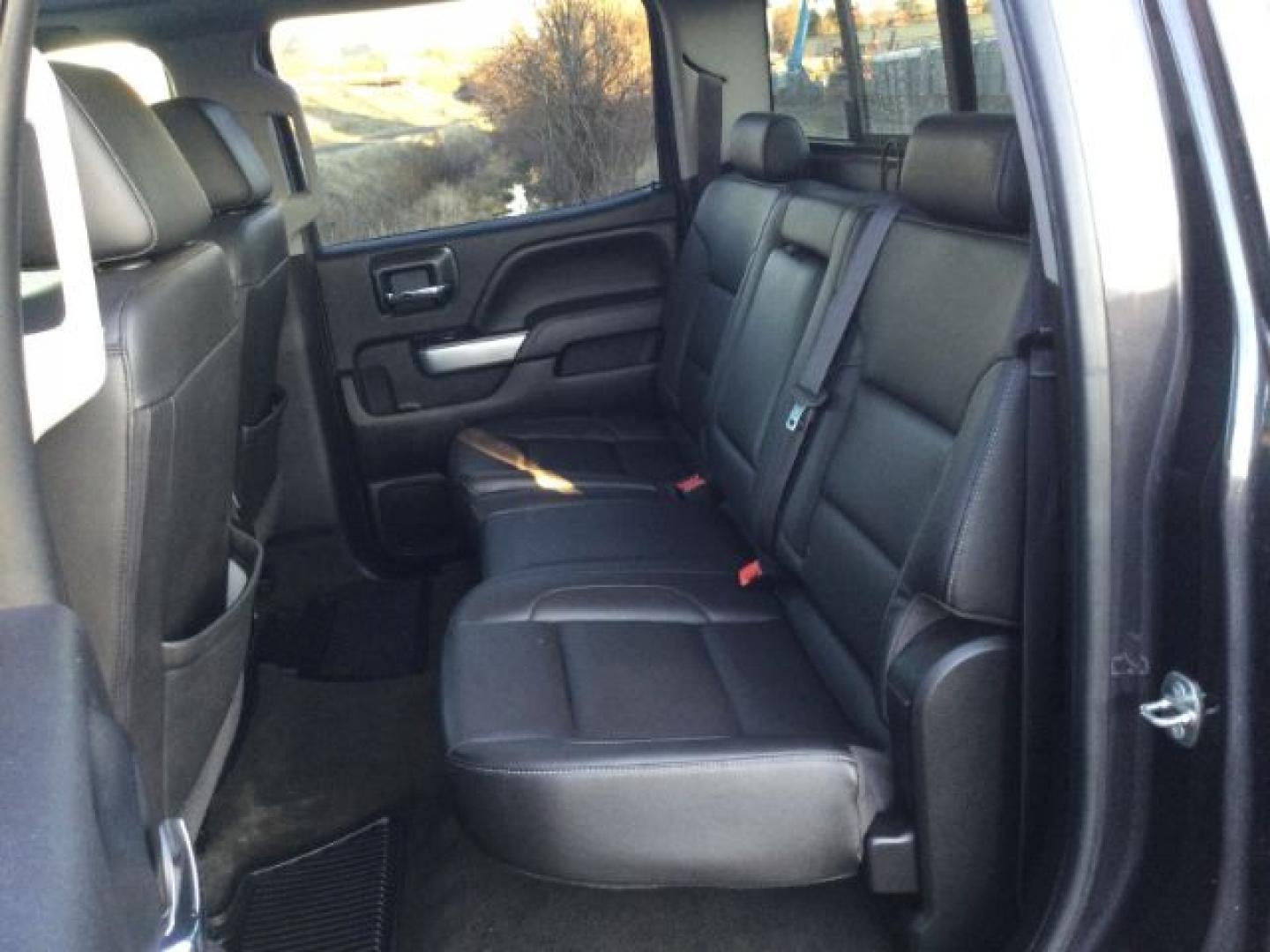 2016 Graystone Metallic /Black Leather Chevrolet Silverado 3500HD LTZ CREW CAB 4X4 (1GC4K0E85GF) with an Duramax 6.6L V-8 diesel direct injection engine, 6-Speed Automatic transmission, located at 1801 Main Street, Lewiston, 83501, (208) 743-9371, 46.417065, -117.004799- Photo#7