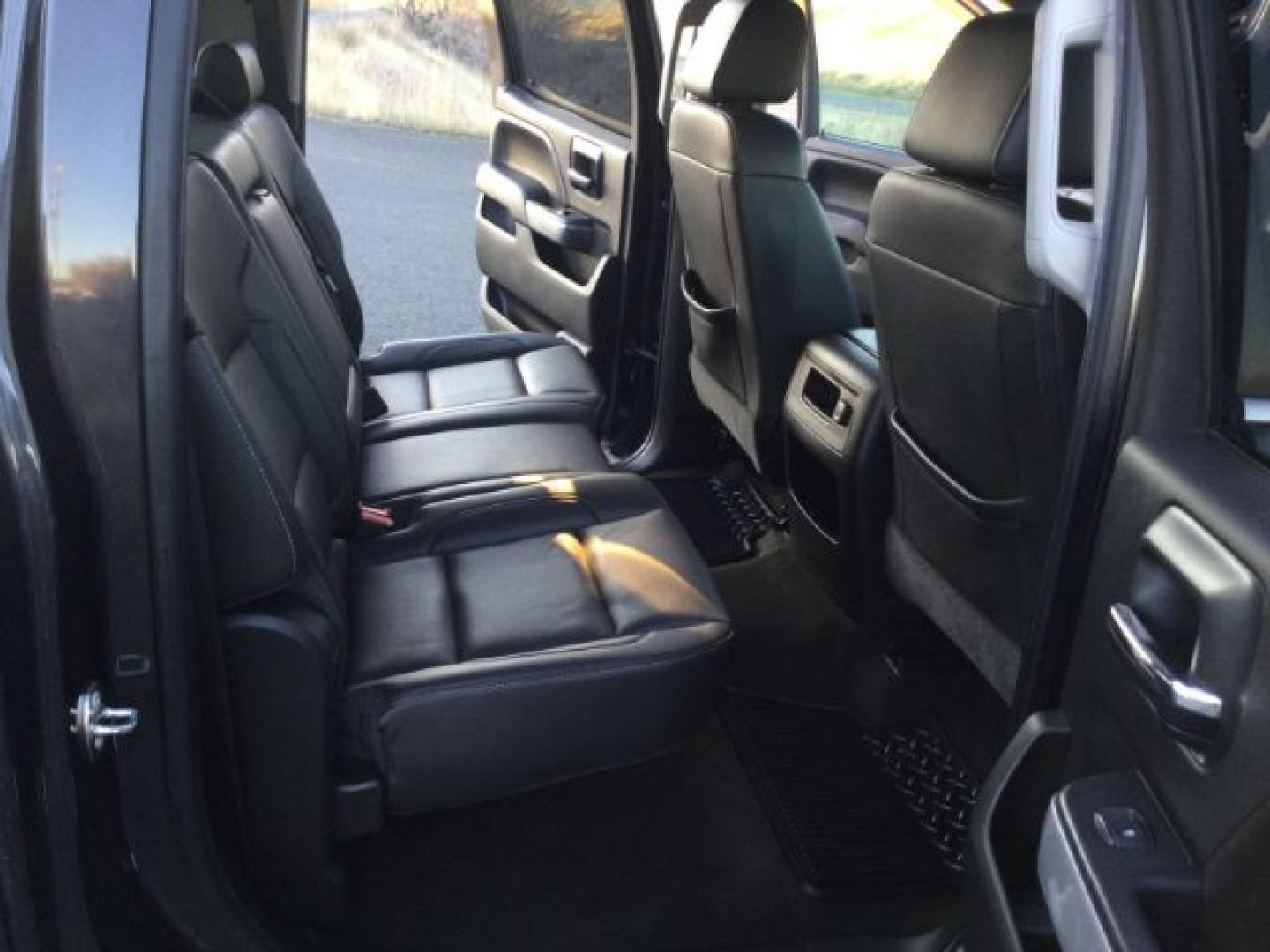 2016 Graystone Metallic /Black Leather Chevrolet Silverado 3500HD LTZ CREW CAB 4X4 (1GC4K0E85GF) with an Duramax 6.6L V-8 diesel direct injection engine, 6-Speed Automatic transmission, located at 1801 Main Street, Lewiston, 83501, (208) 743-9371, 46.417065, -117.004799- Photo#8